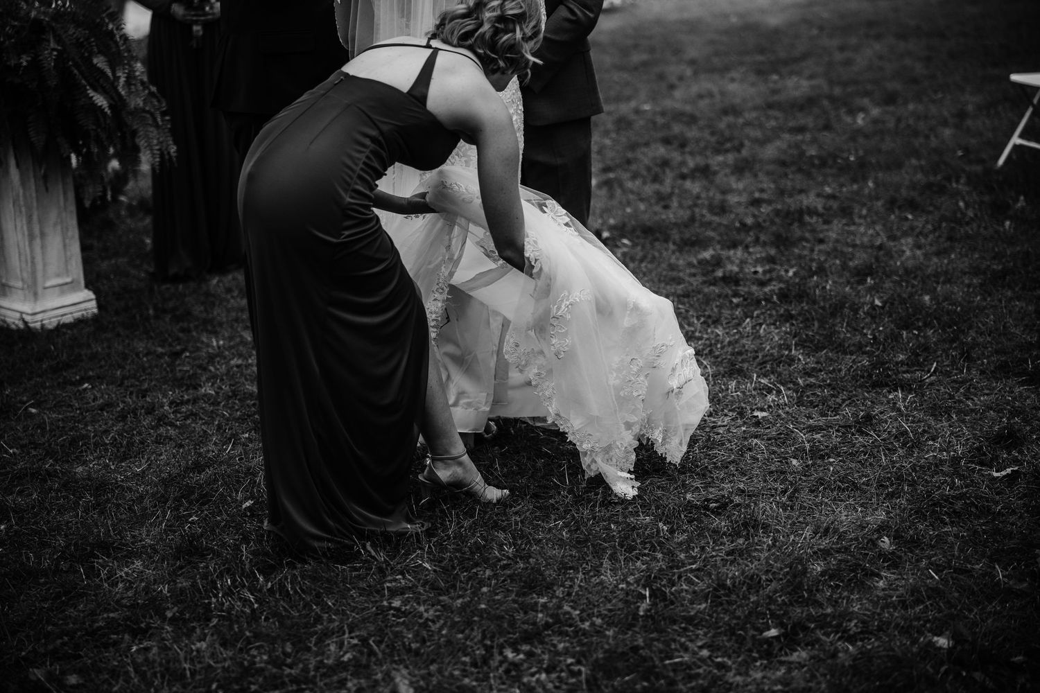 Black and white photo of joyful moments during a wedding celebration.