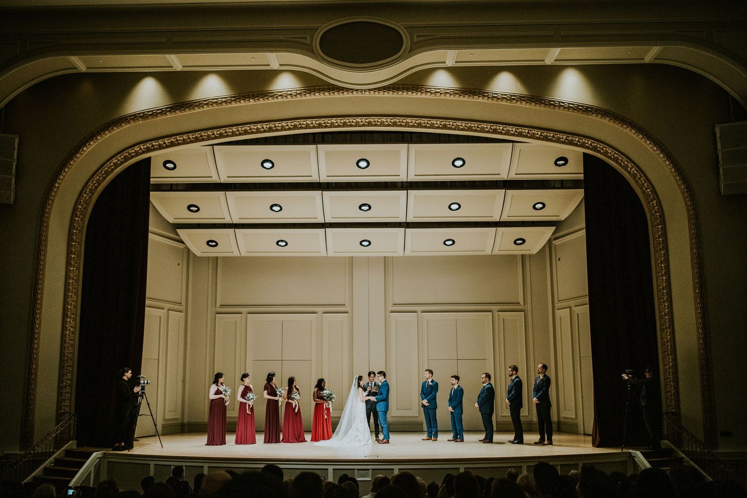 A series of five photos showing a wedding ceremony and reception in an elegant venue with classic architecture.