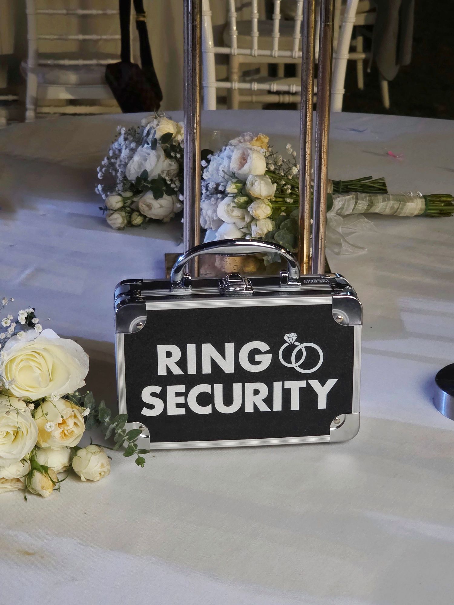 wedding ring security box detail with flowers during reception setup in Puerto Vallarta Mexico captured by wedding content creator moments!
