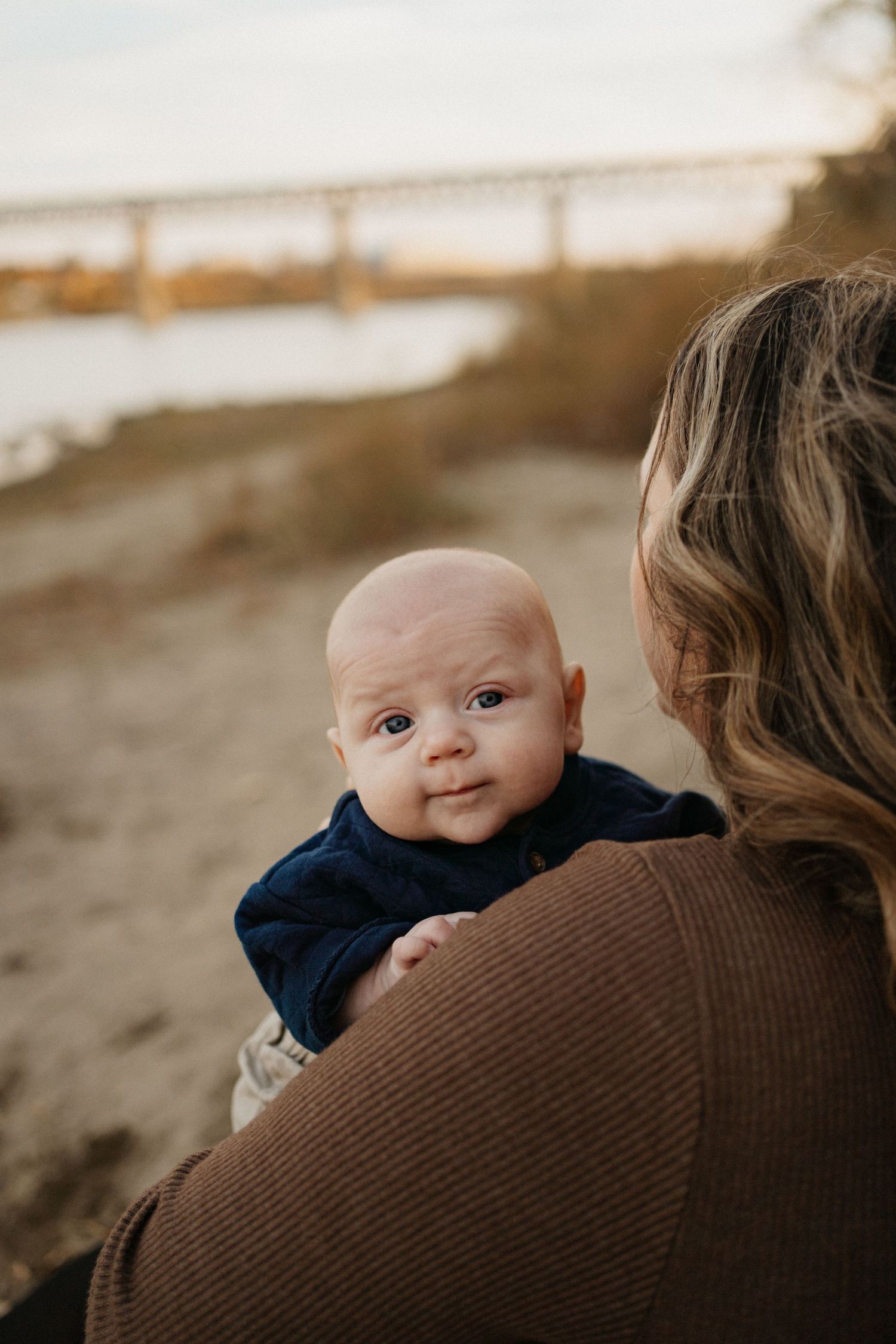 a mother holds her son