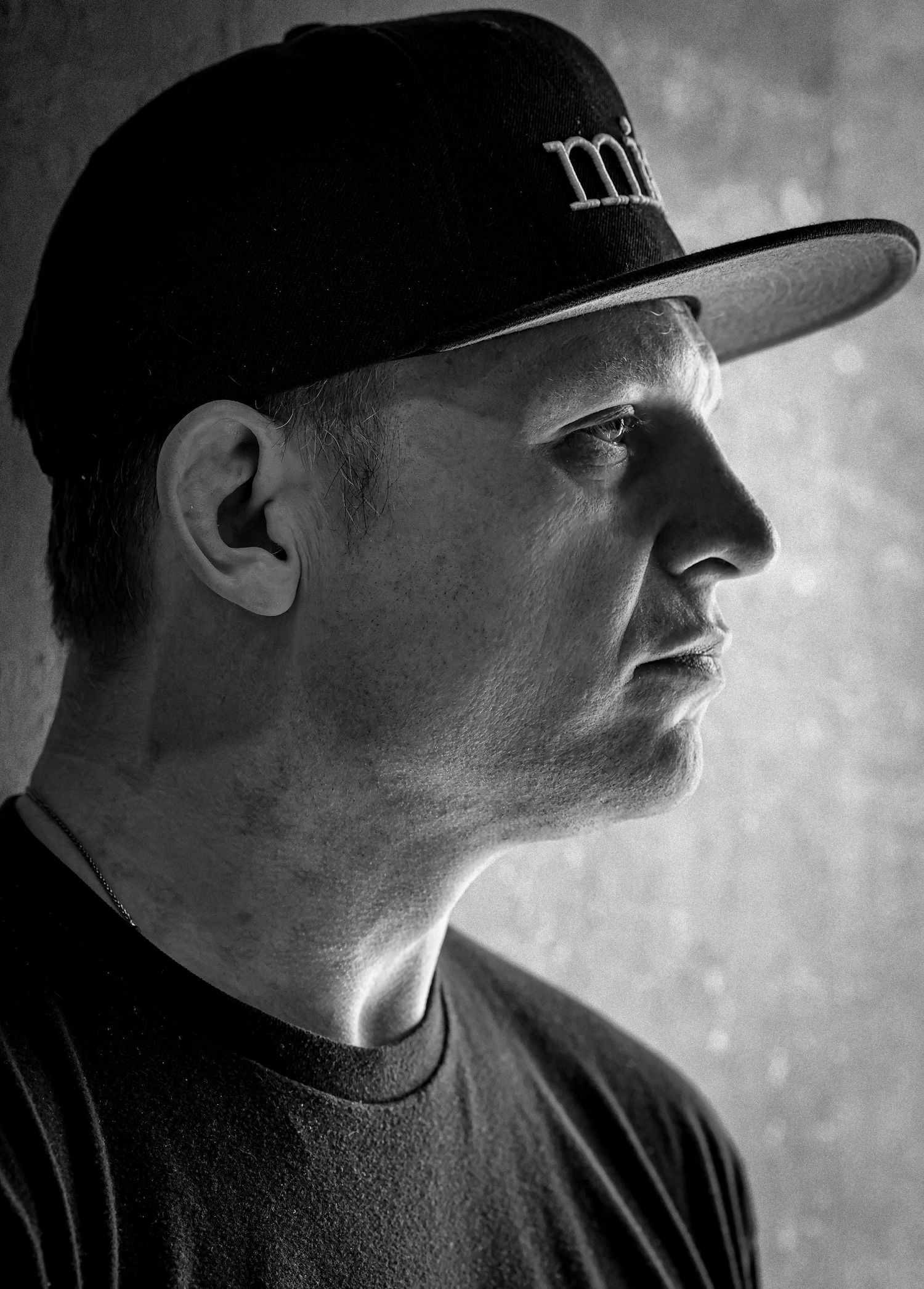 Side profile portrait of head instructor of Misfits Jiujitsu.
