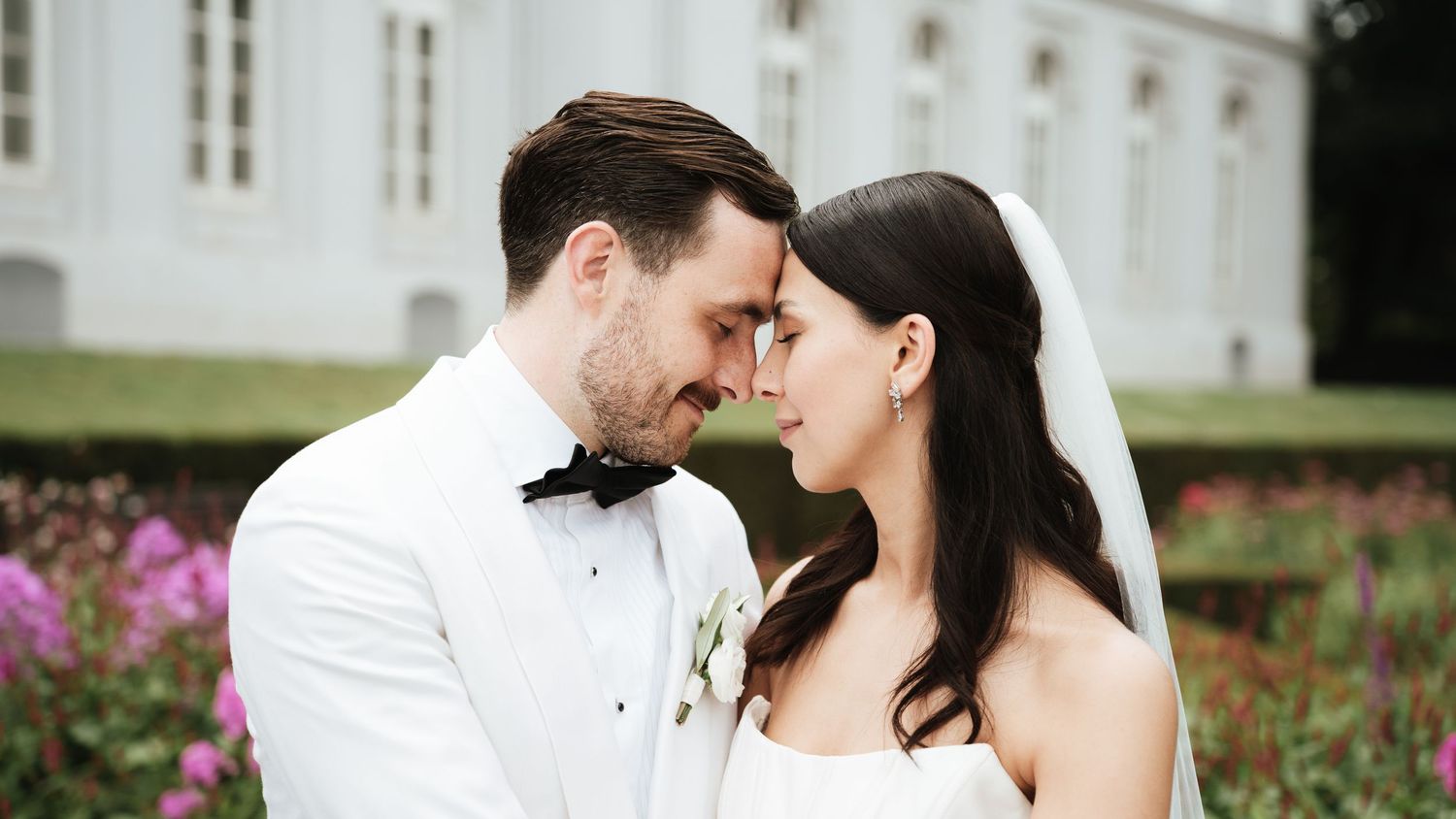 A romantic wedding couple embraces in a garden setting while sharing intimate moments across four connected photos.