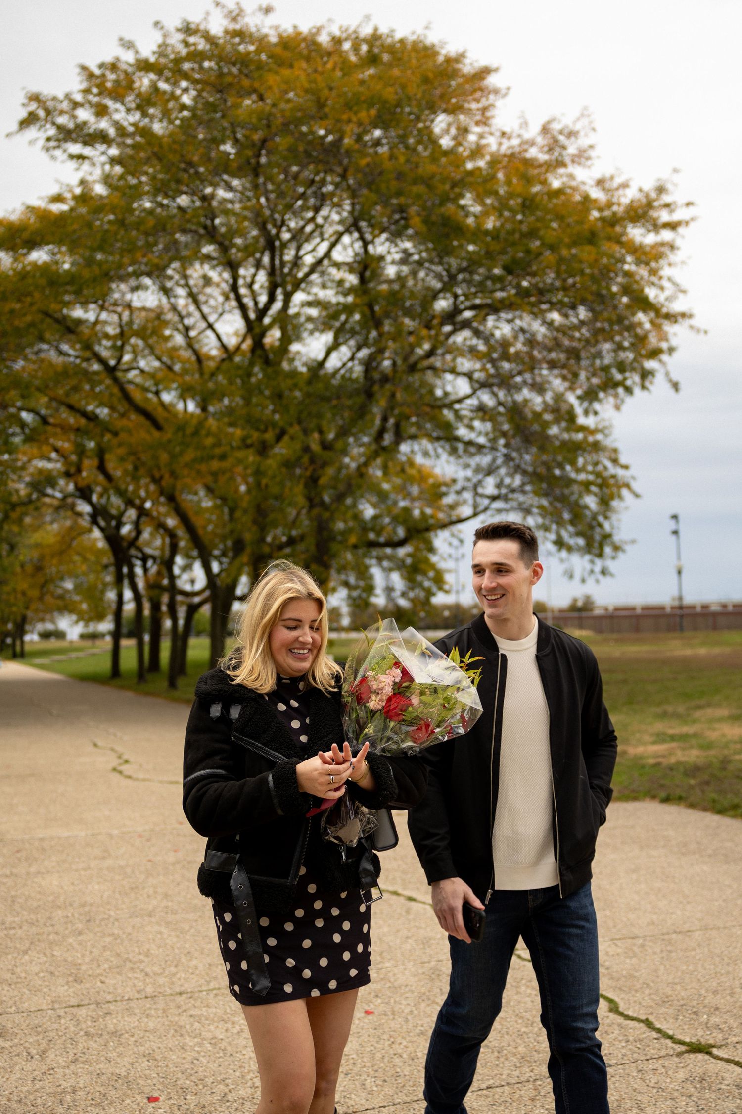 After Sean proposed to Sydney at Milton Lee Olive Park near Navy Pier in Chicago!