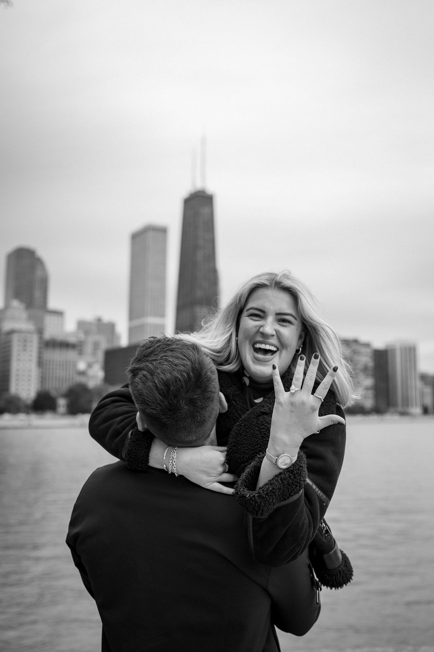After Sean proposed to Sydney at Milton Lee Olive Park near Navy Pier in Chicago!
