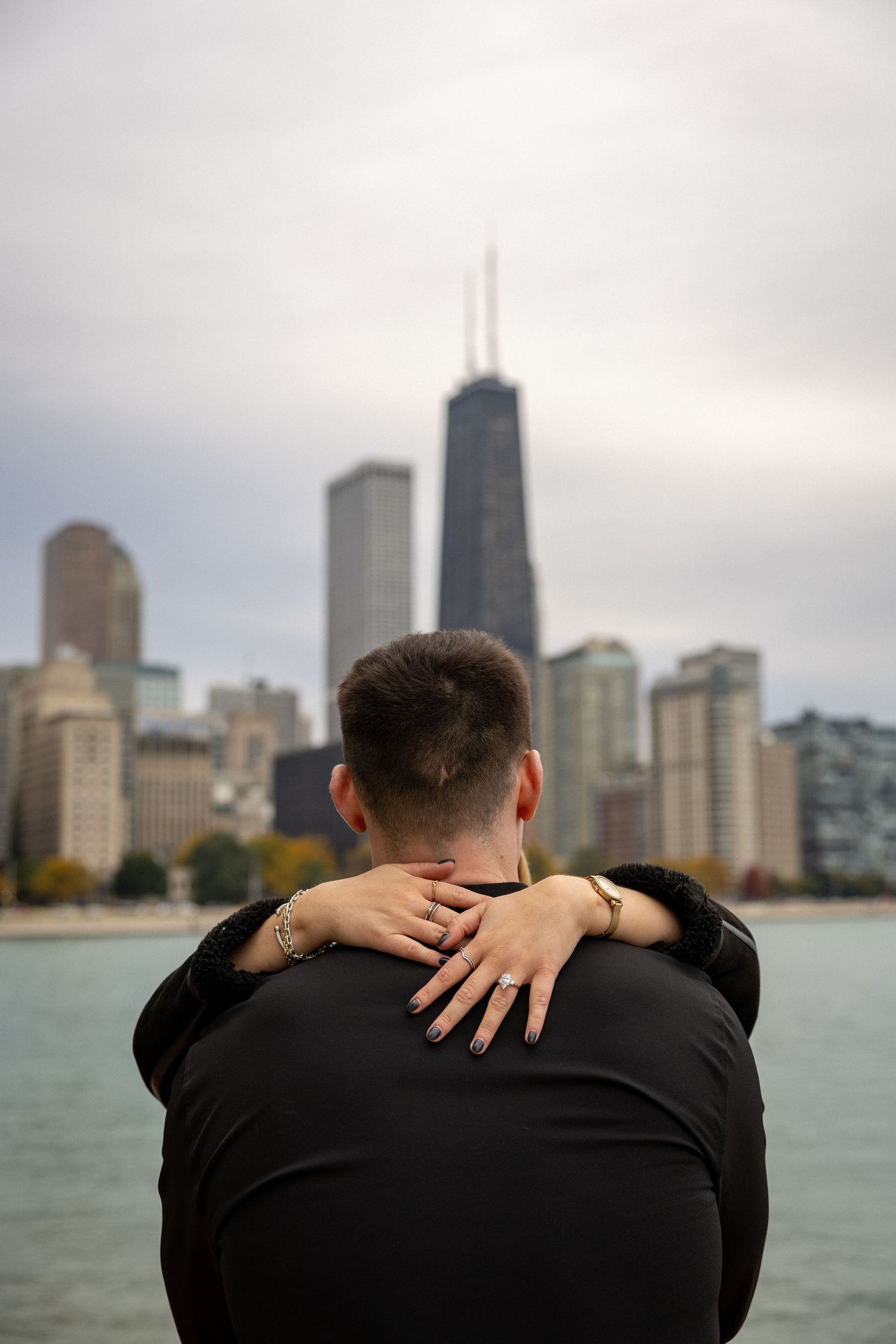 After Sean proposed to Sydney at Milton Lee Olive Park near Navy Pier in Chicago!