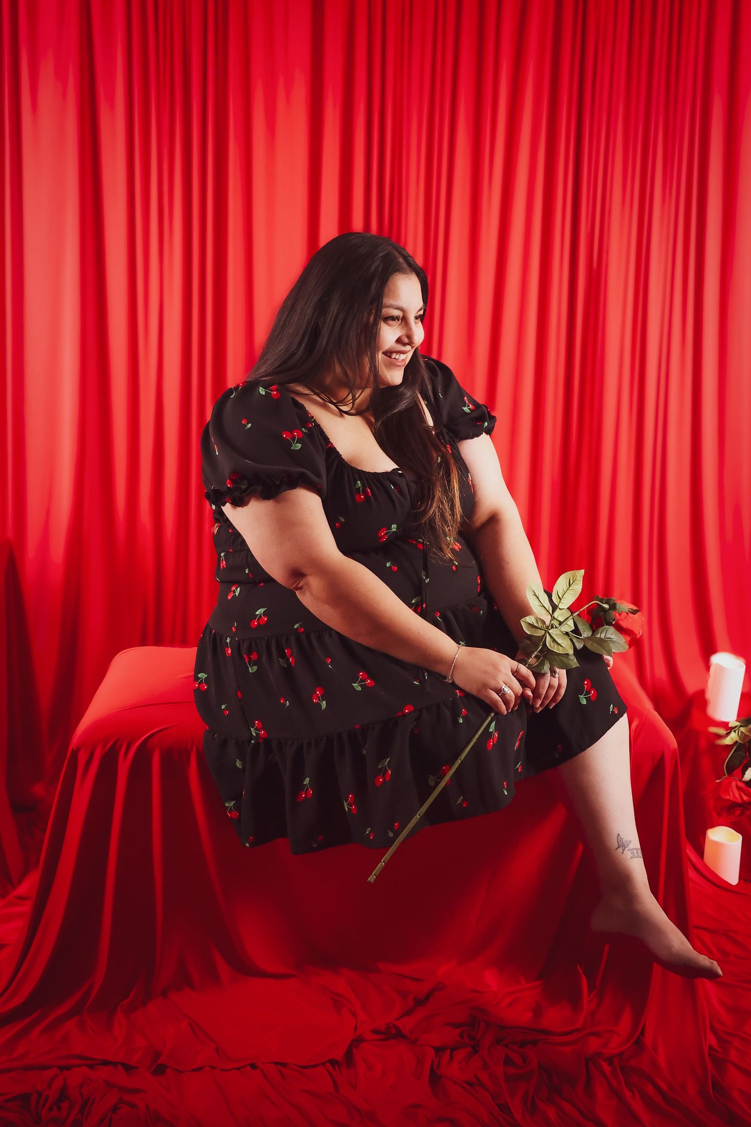 Portrait of Jazmin Rae, co-owner of 818 Films, sitting a studio setting.