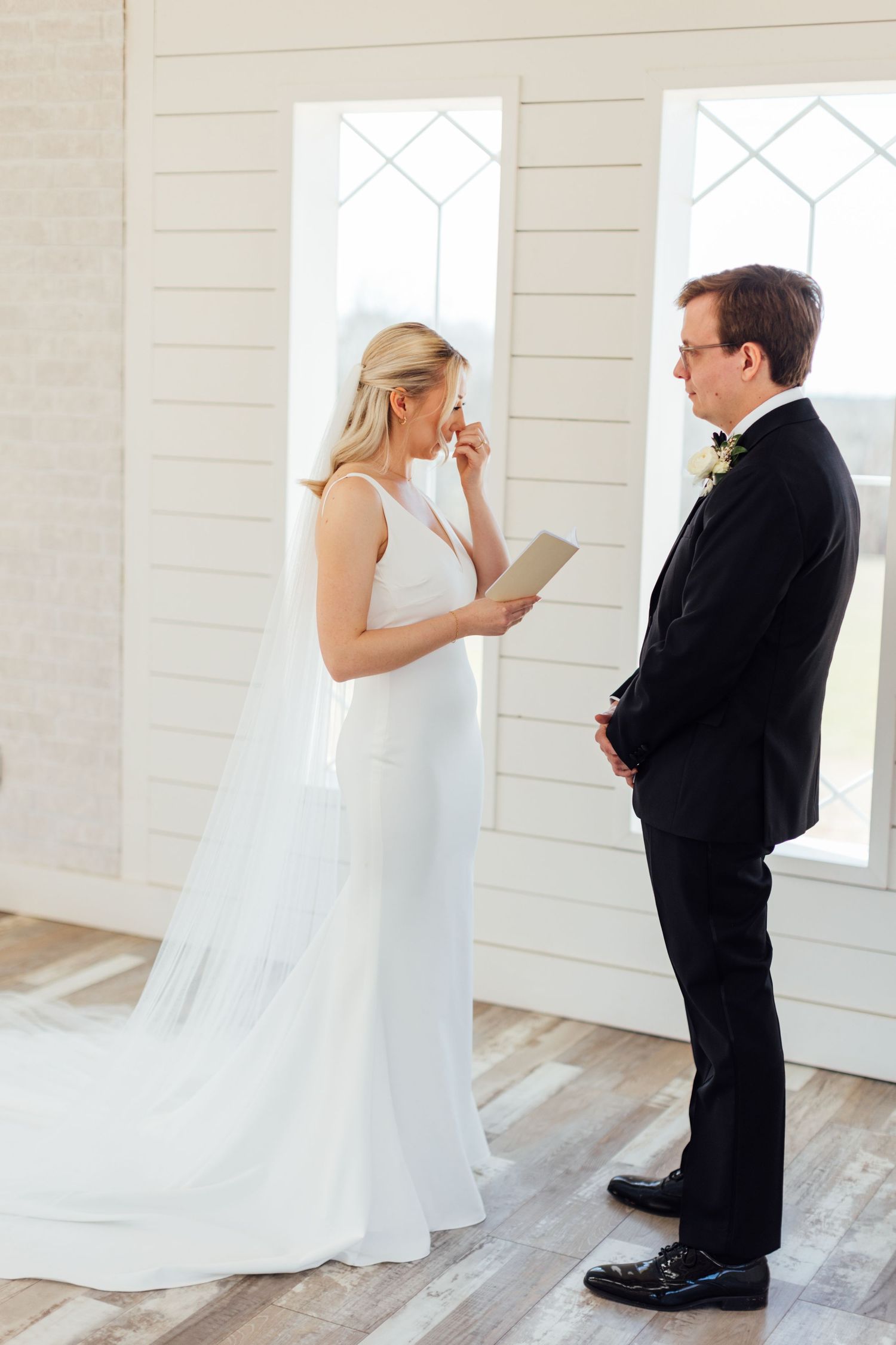 Wedding first look reaction sequence showing bride and groom's emotional response.