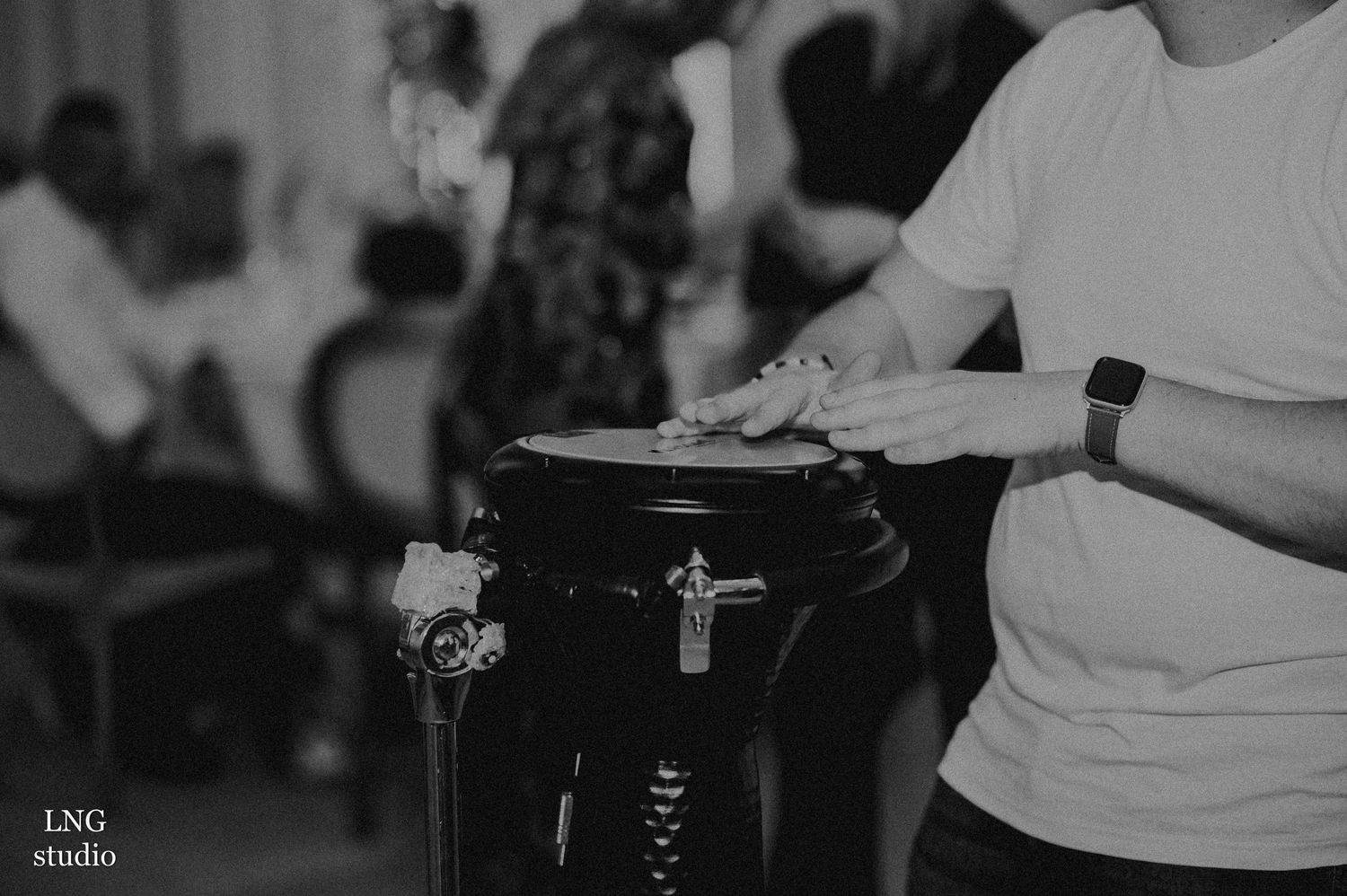 Black and white candid shots of people mingling at an event.