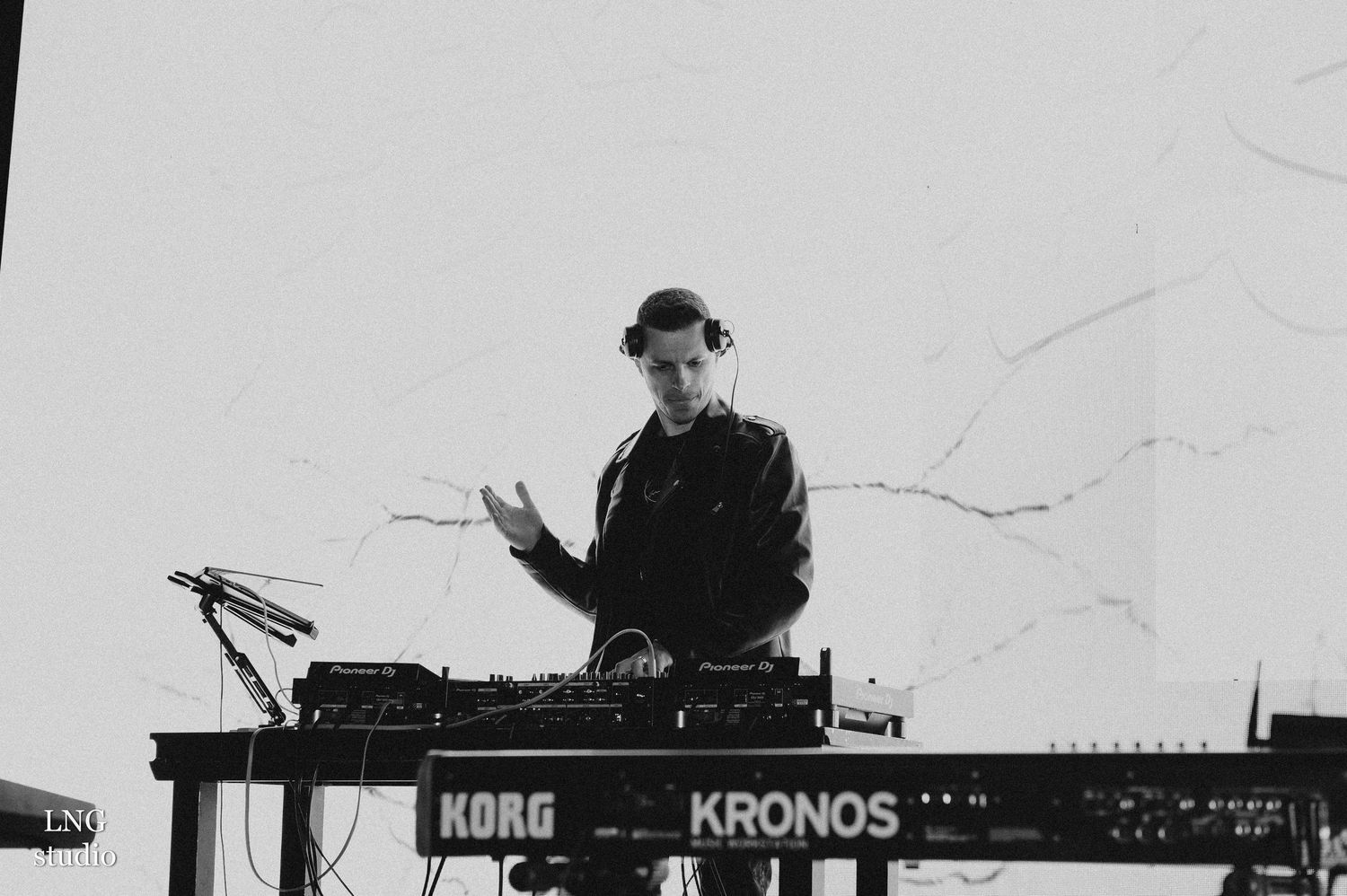 Black and white photo of musical equipment including Korg Kronos keyboard.