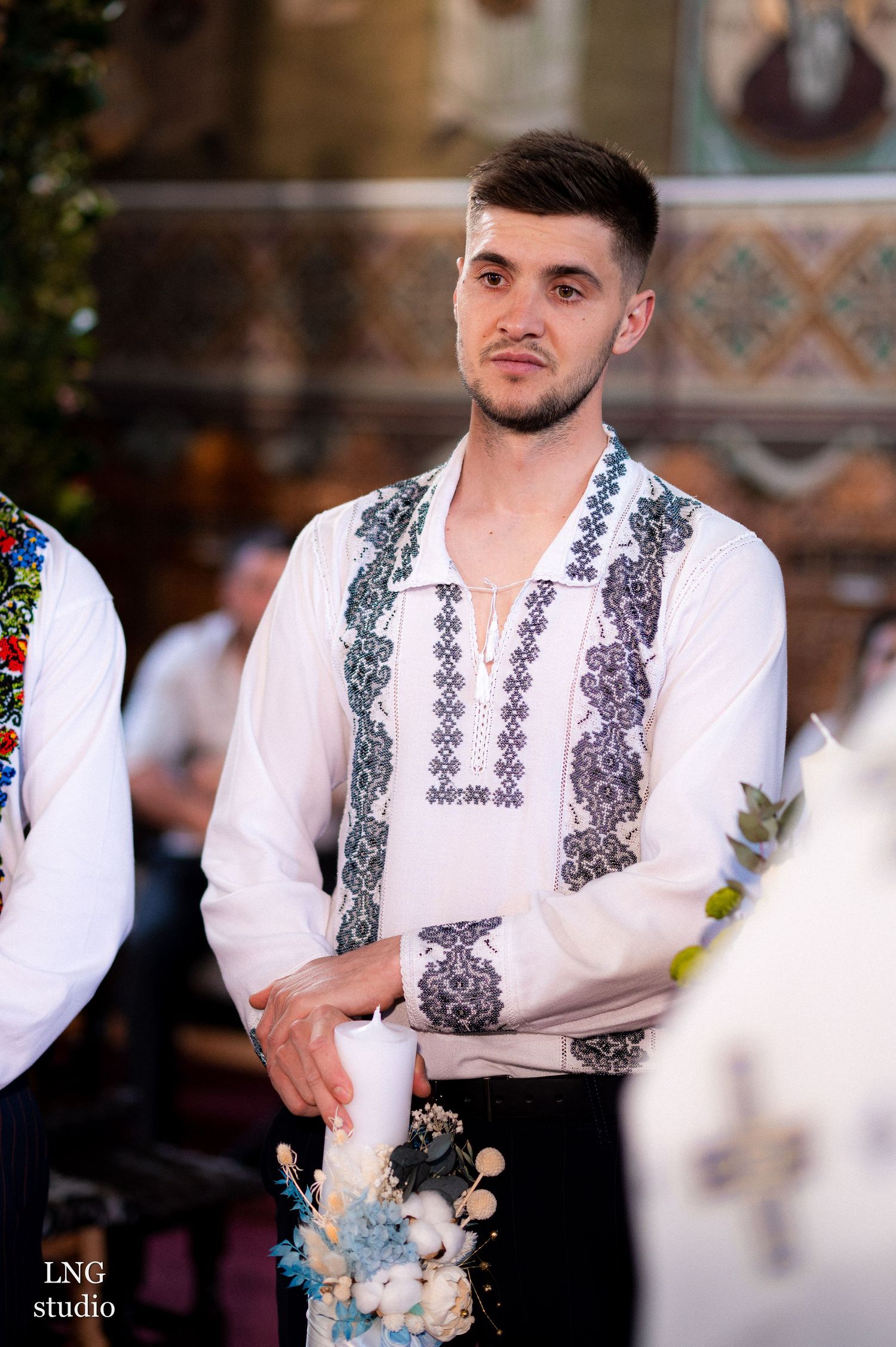 Traditional embroidered Ukrainian vyshyvanka shirt with black patterns on white fabric.