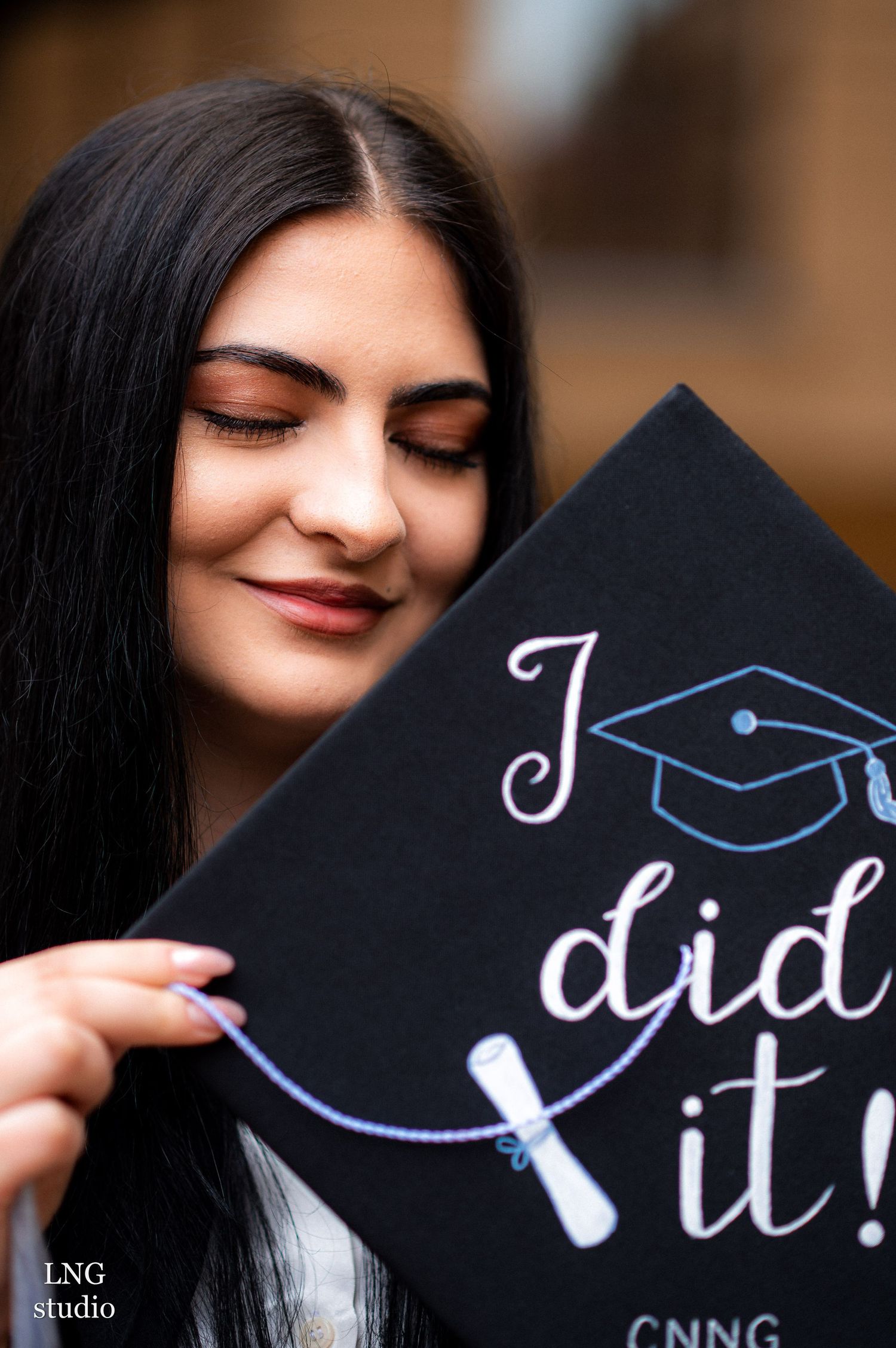 Creative graduation cap photo series showing decorative text and design details.
