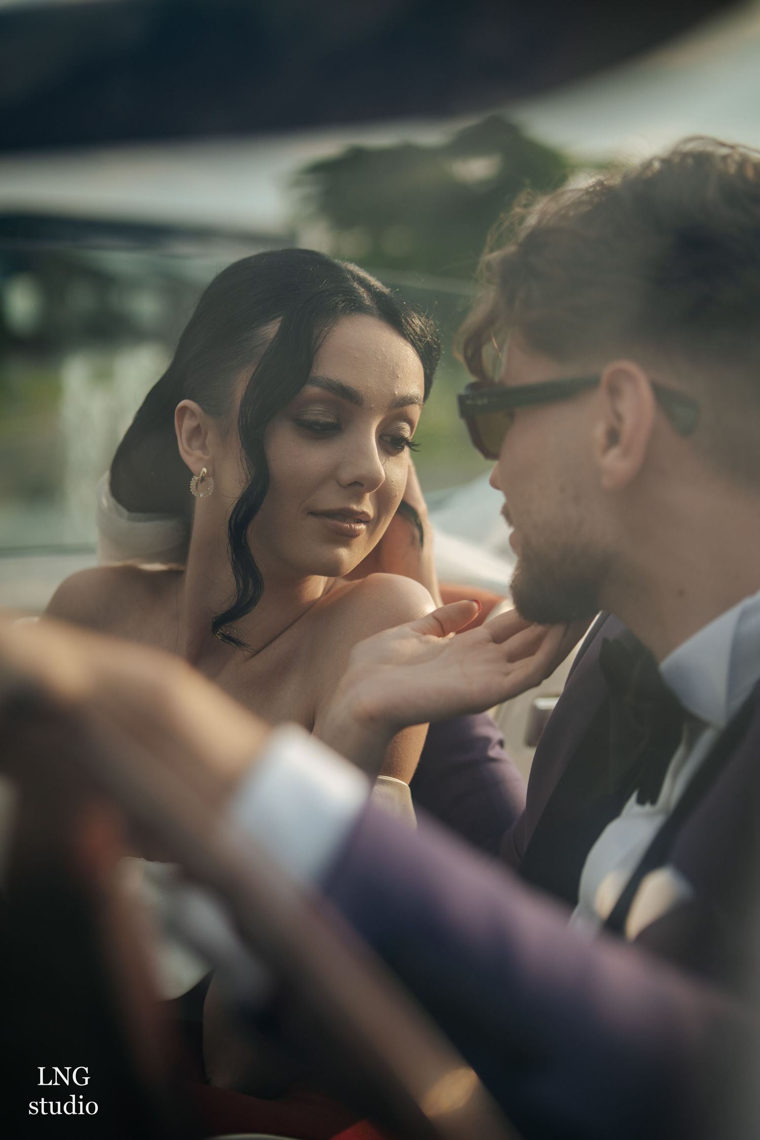 A series of intimate wedding photos arranged in a romantic progression showing tender moments between a couple.