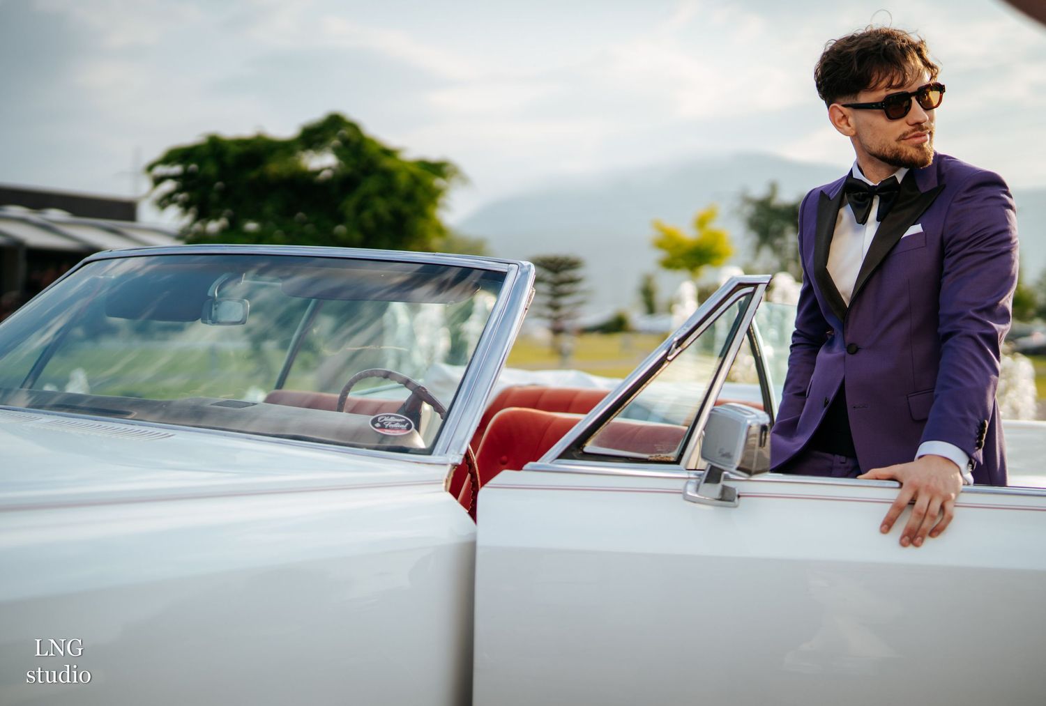 Classic white vintage car door and fender shown from multiple angles with retro styling details.