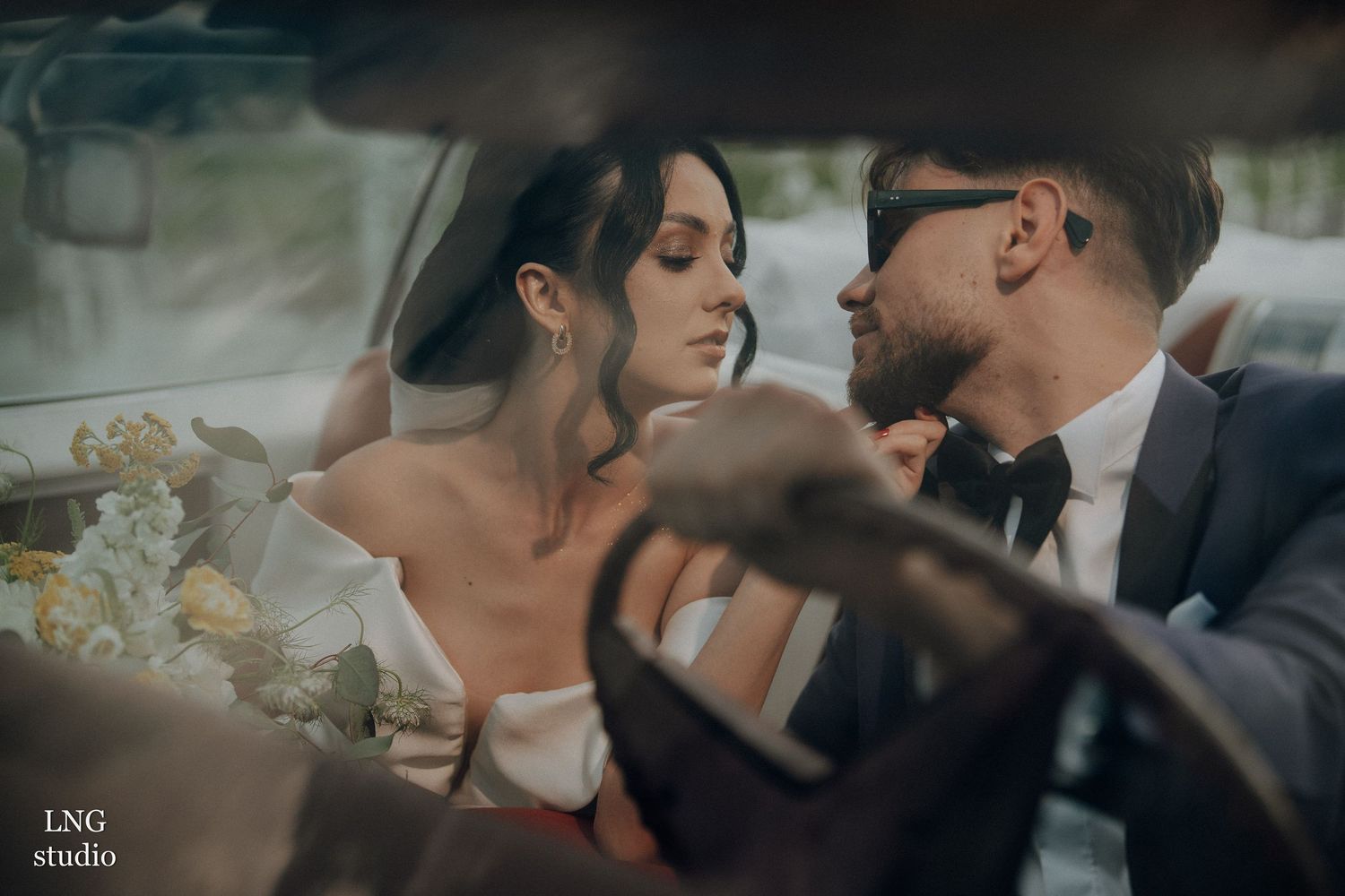 Romantic wedding couple sharing intimate moments in multiple photos while dressed in formal wedding attire.