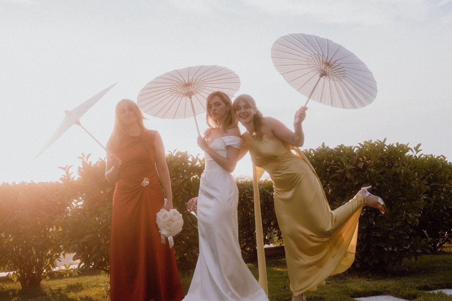 Bride posing happily with her sisters – Restaurant & Villa Morgan, Istra, Croatia