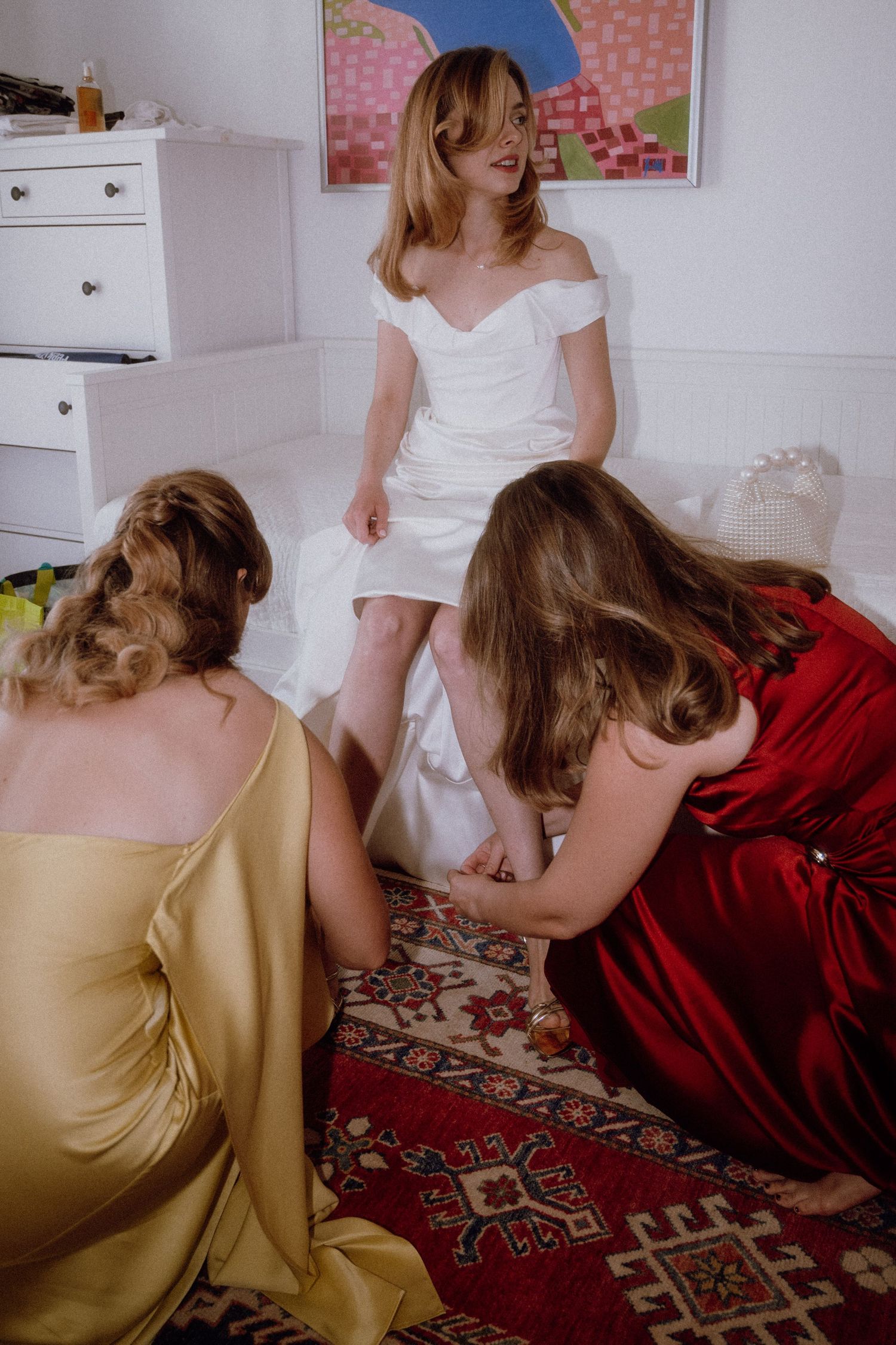 Bride getting dressed with the help of her sisters before the ceremony – Restaurant & Villa Morgan, Istra, Croatia