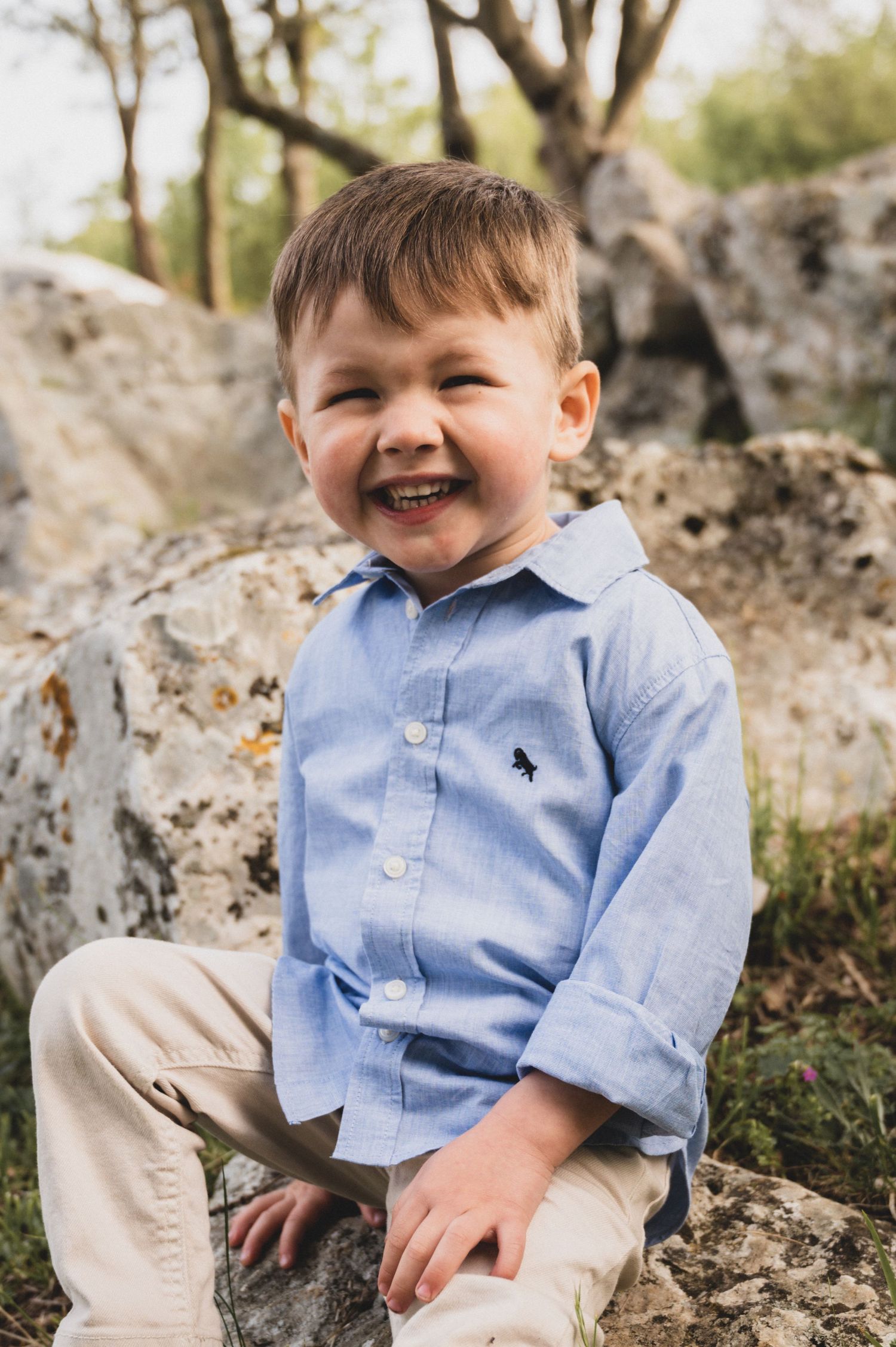 Young boy smiling adorably for a playful portrait – Croatia