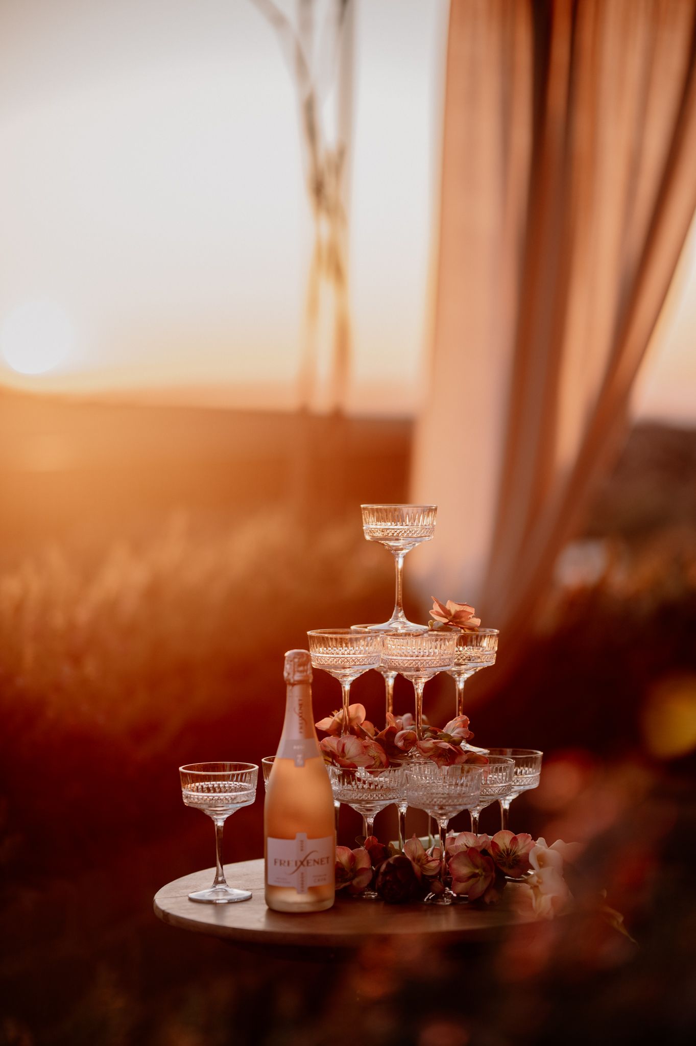 Champagne glass pyramid sparkling at sunset at San Canzian Hotel & Residences – Istria, Croatia