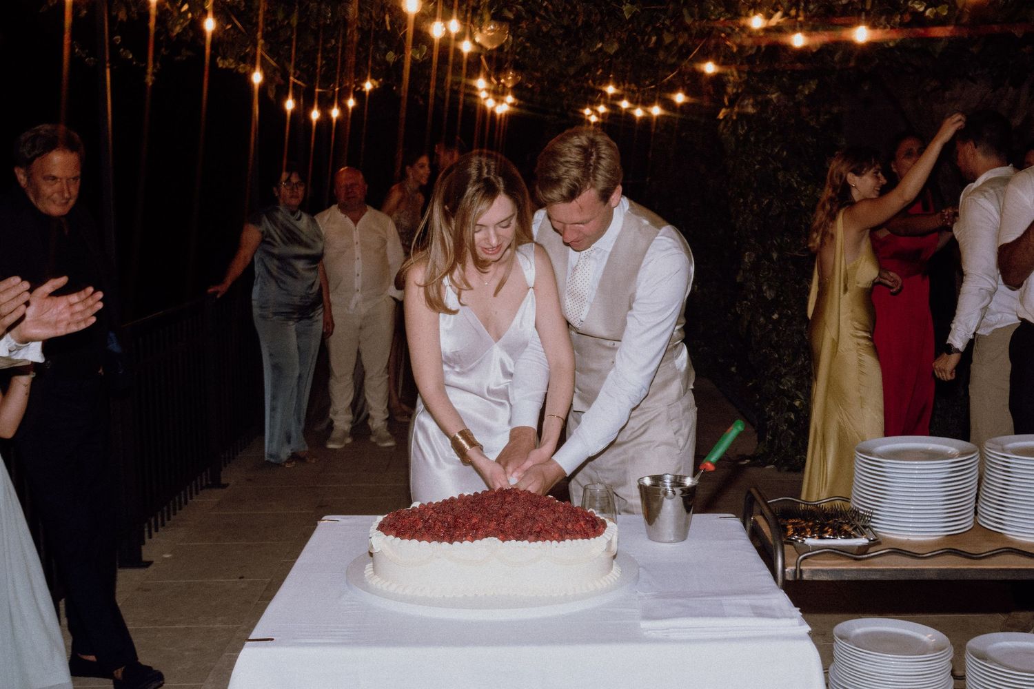 Newlyweds cutting their wedding cake together – Restaurant & Villa Morgan, Istra, Croatia