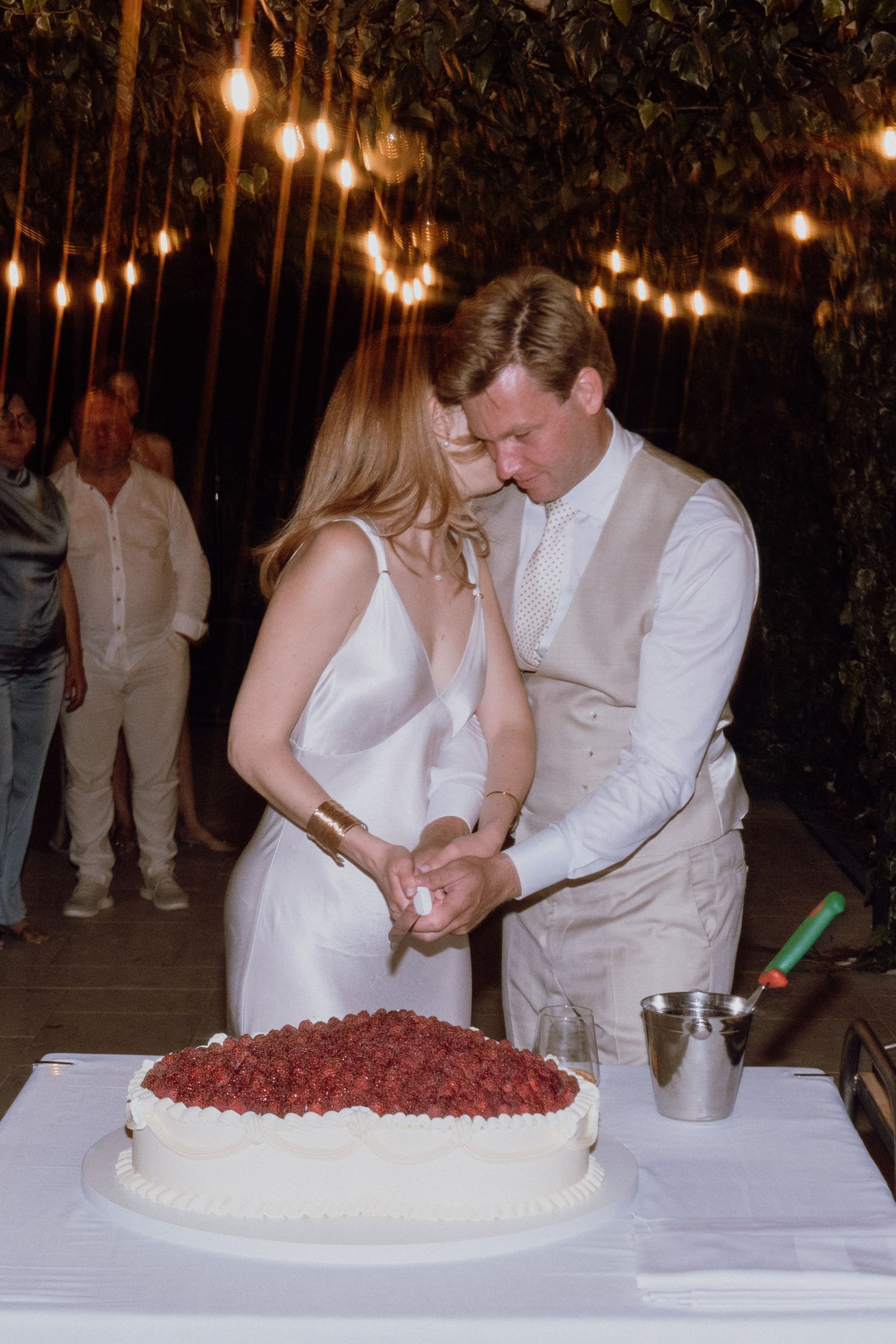 Newlyweds from Brtonigla cutting their wedding cake together – Restaurant & Villa Morgan, Istra, Croatia