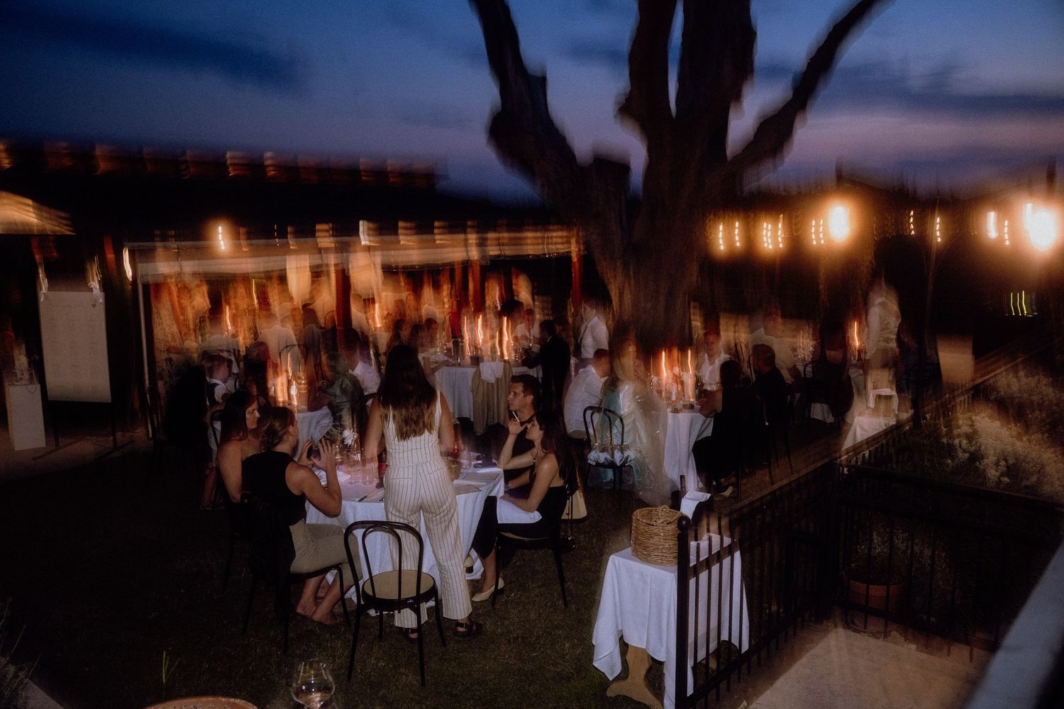 Wedding guests enjoying a dinner reception in a beautifully decorated venue, 
Restaurant&Villa Morgan, Croatia