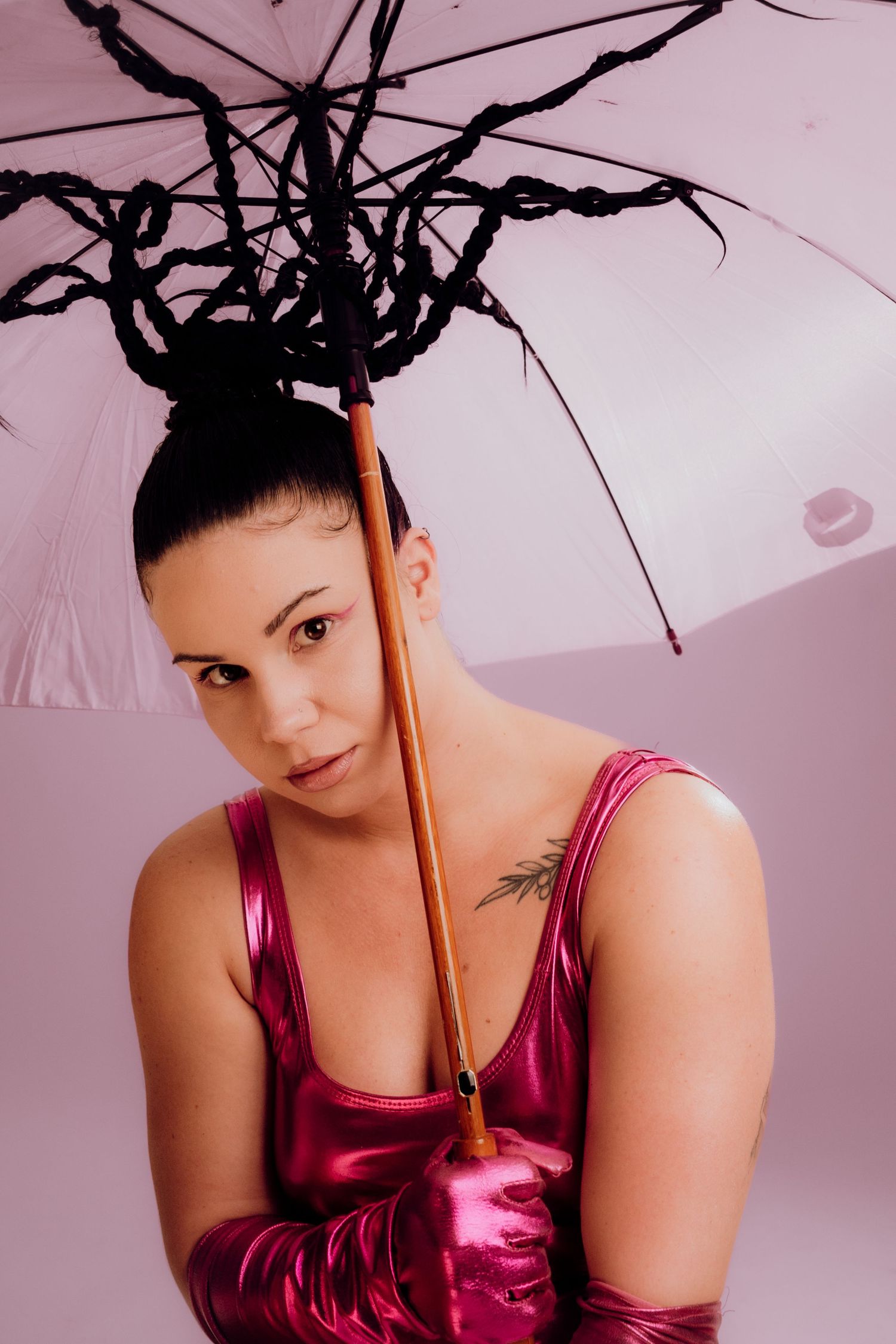 Artistic model holding an umbrella in a creative fashion photoshoot – Croatia