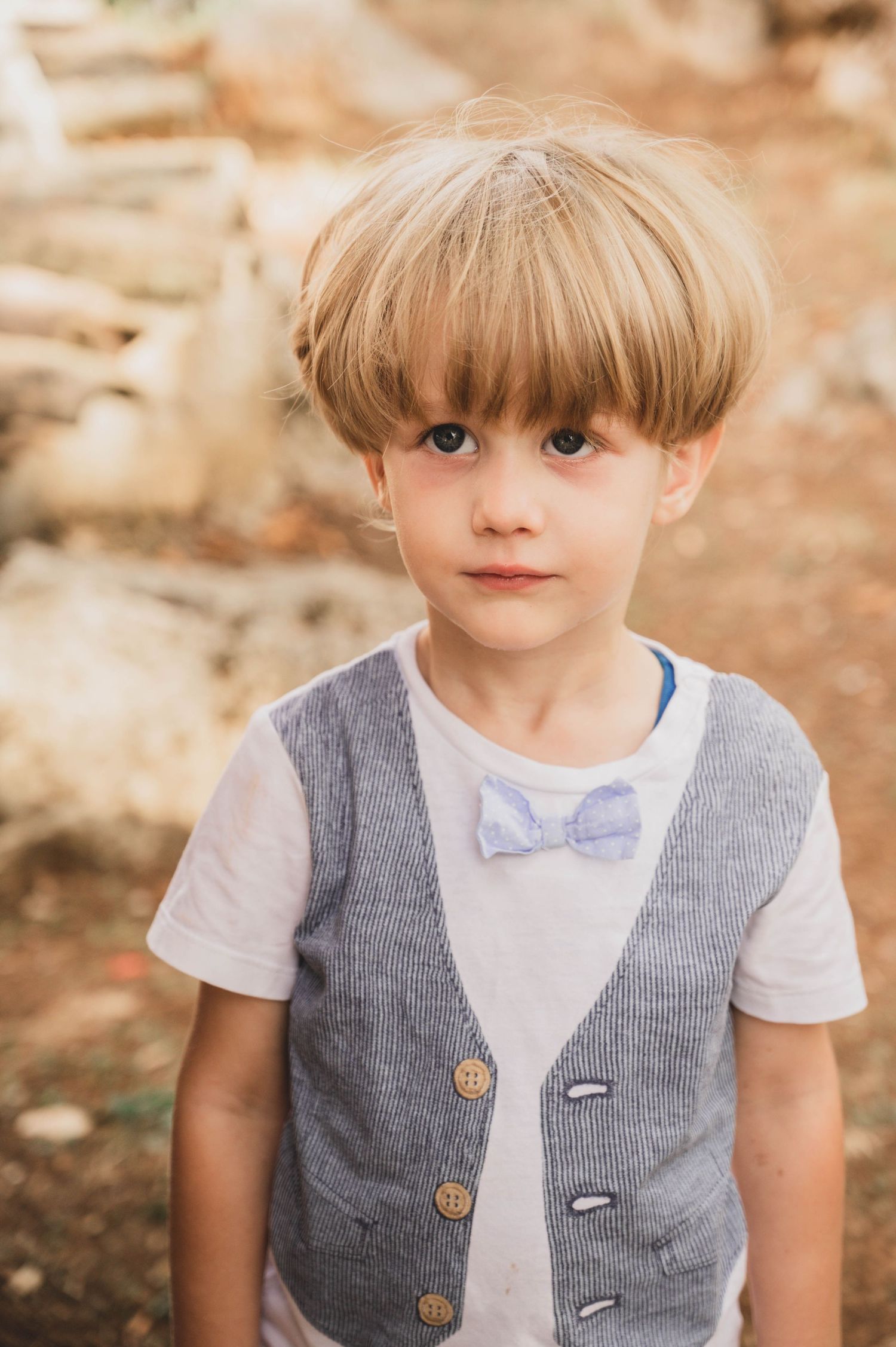 Young boy posing confidently for a playful portrait – Istria, Croatia