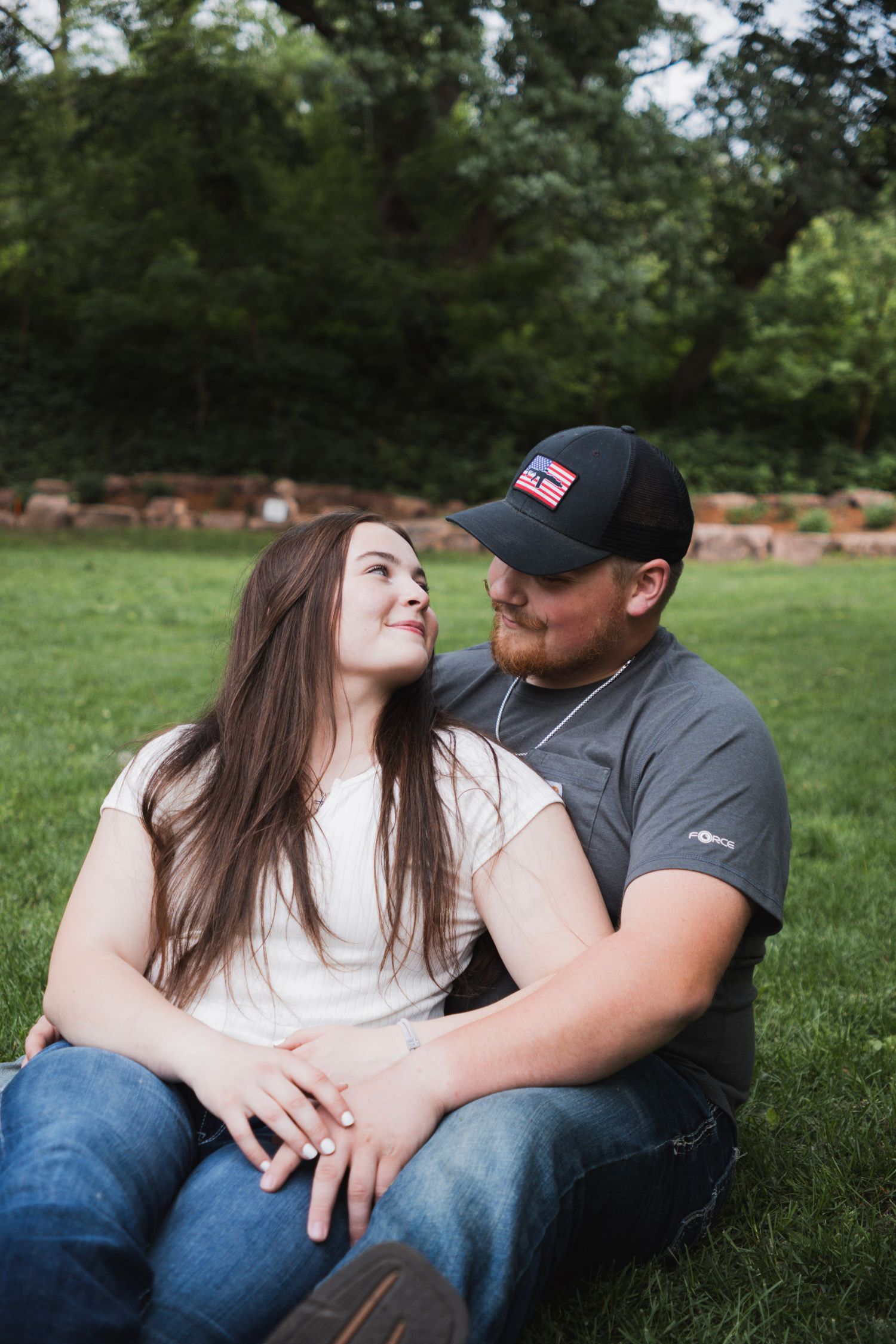 engagement picture couple looking at each other