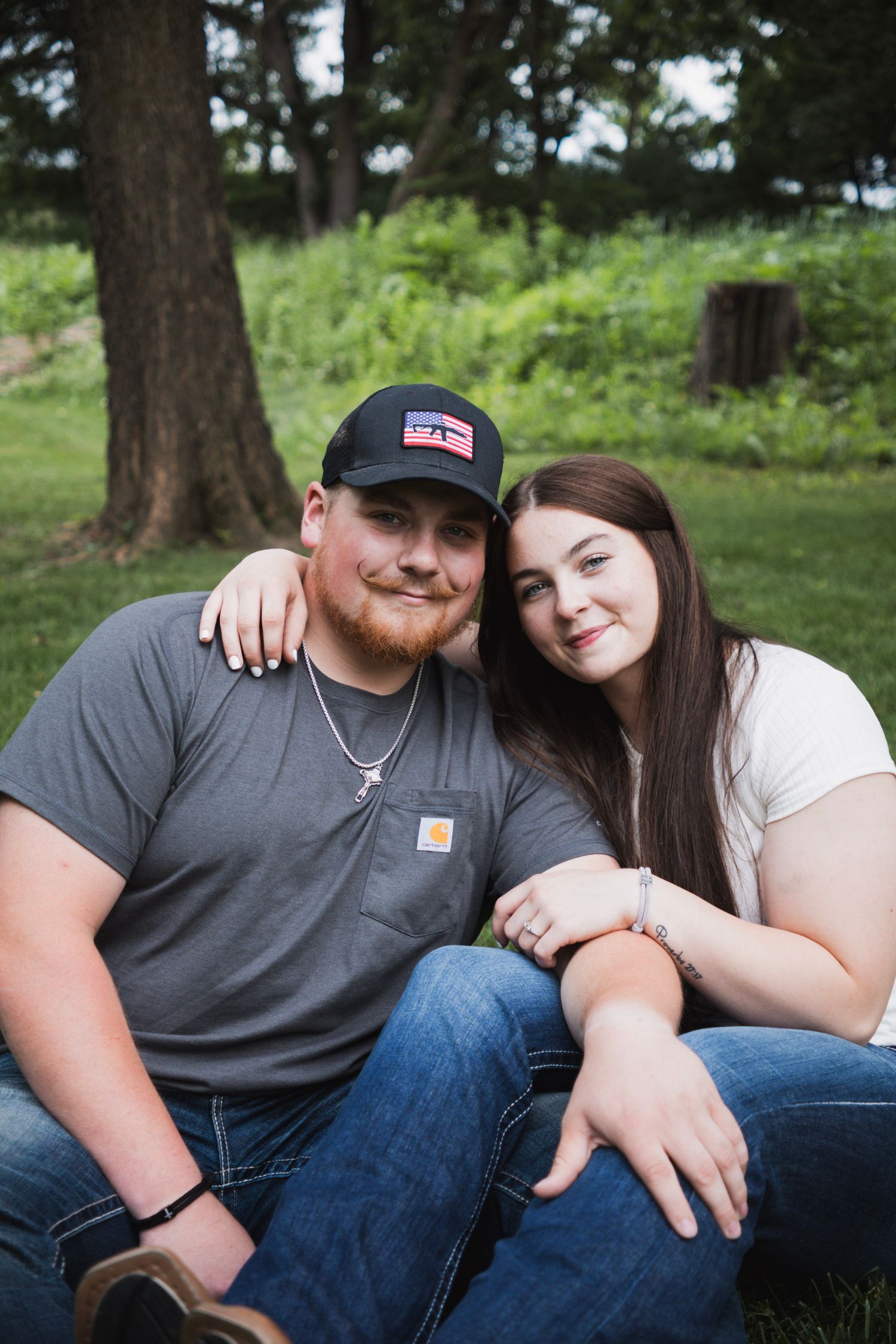 engagement picture man wearing a hat