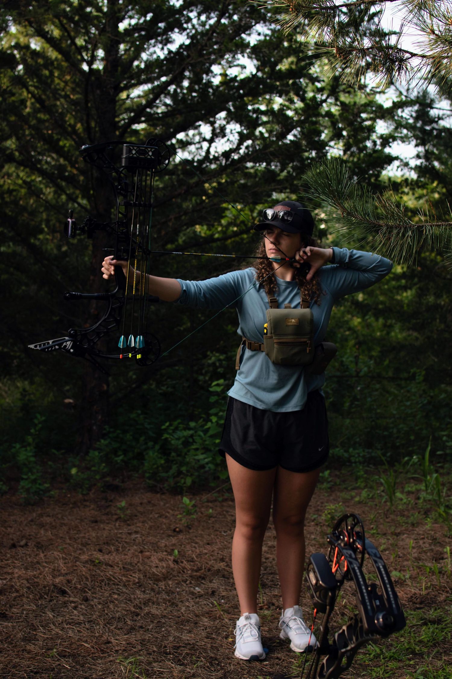 girl shooting a bow
