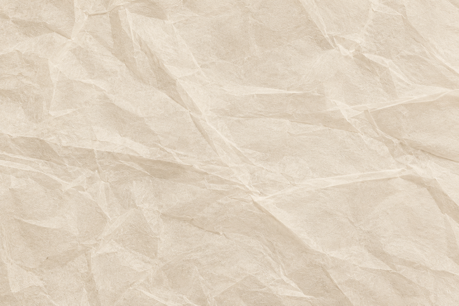 Close-up of crumpled beige paper texture with natural wrinkles and folds, ideal for backgrounds.