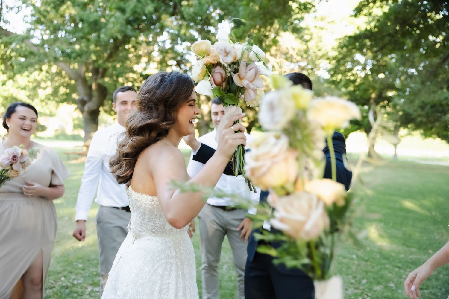 A series of joyful candid moments captured at an outdoor wedding celebration in a sunlit garden setting.