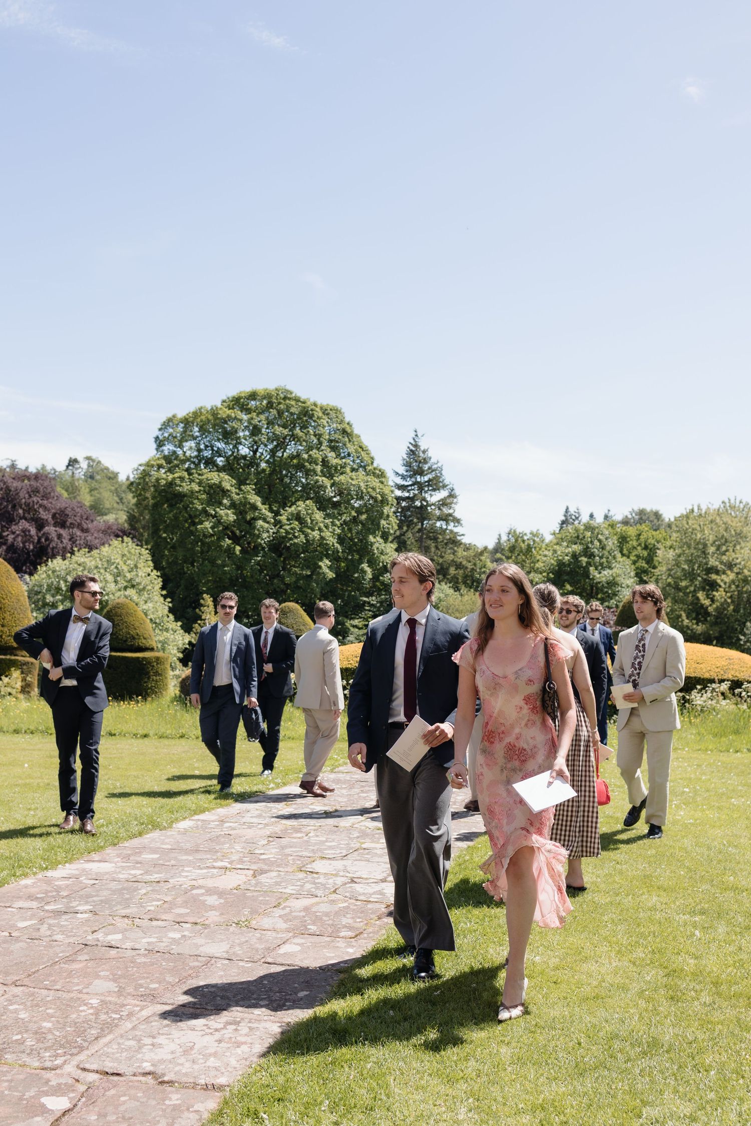 guests gather on lawn