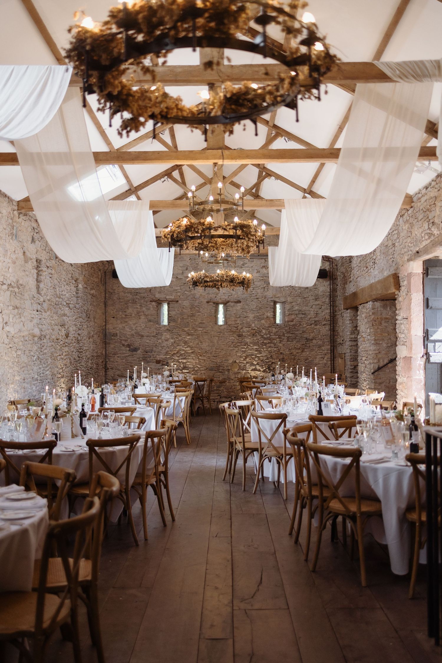 Elegant dinner setup in the barn at Holesfoot