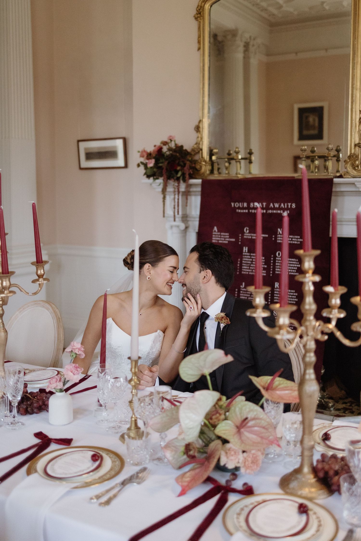 couple embrace at Berwick House dining table