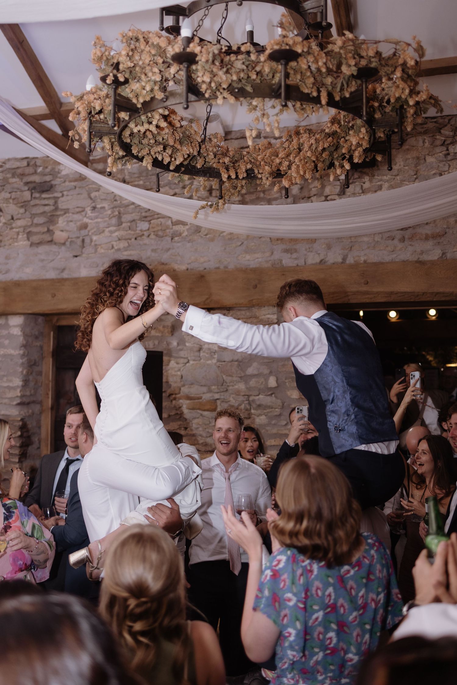 bride and groom at their evening reception at Holesfoot