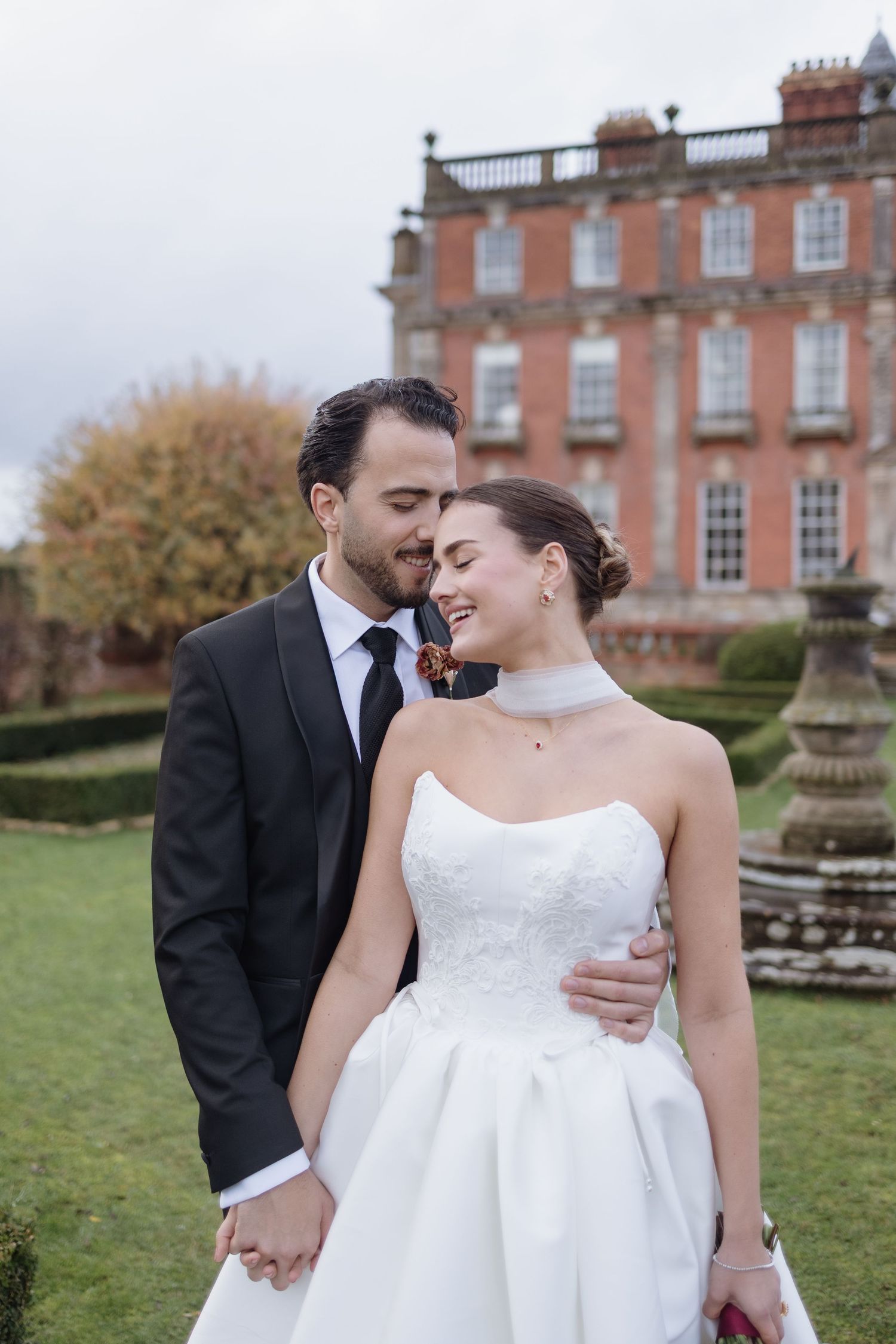 Classic portrait of couple in front of Berwick House façade