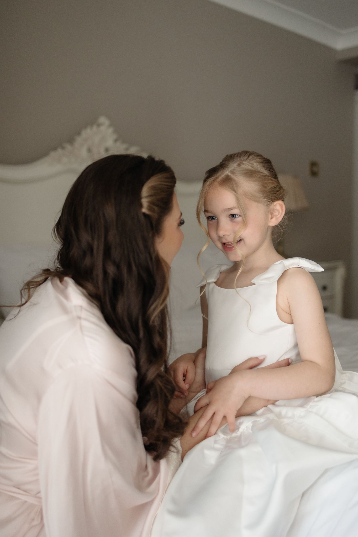 Intimate moment between bride and her daughter before the ceremony