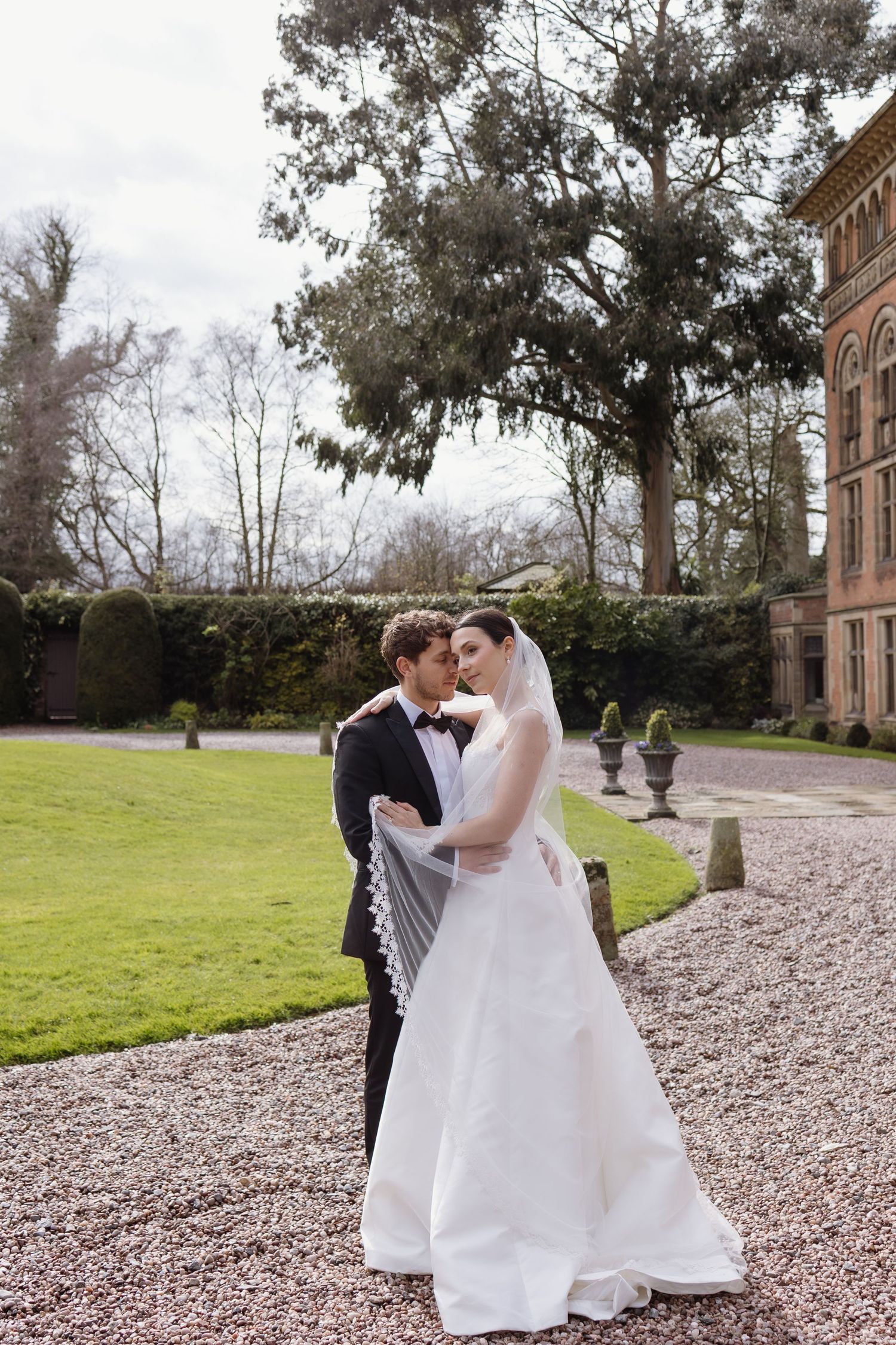 couple hugging at Soughton Hall