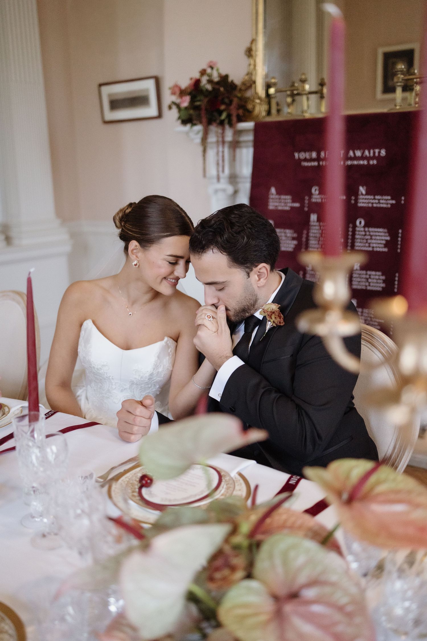 Candid photo of couple sharing a toast at Berwick House reception