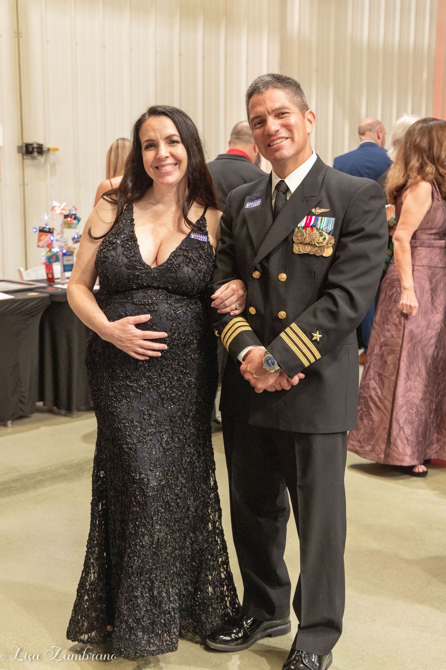 Couple in formal attire at the Milvet 10th Anniversary Honors Gala at March Field Air Museum.