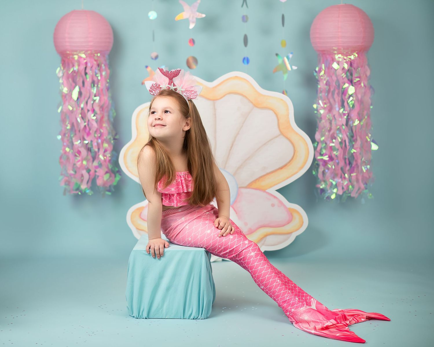 Children photography photoshoot in Gravesend Kent with girl dressed as mermaid in themed studio setup