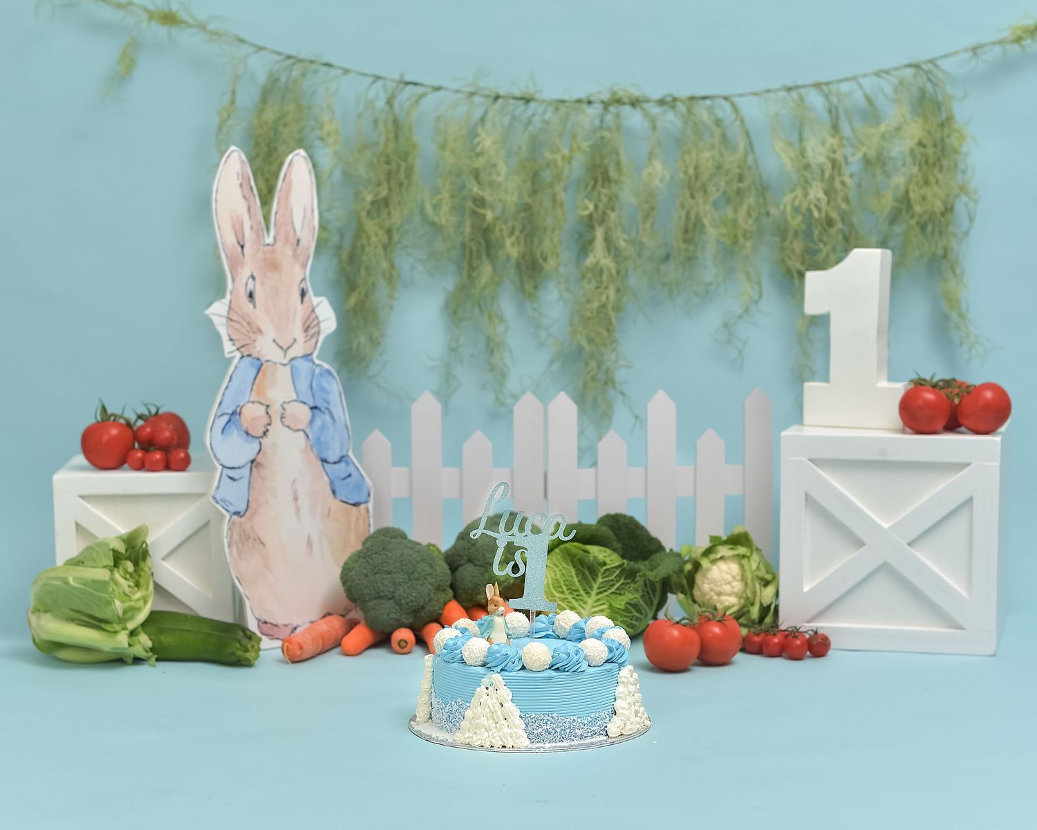 Cake smash photoshoot in Gravesend Kent with bunny themed first birthday setup and cake display