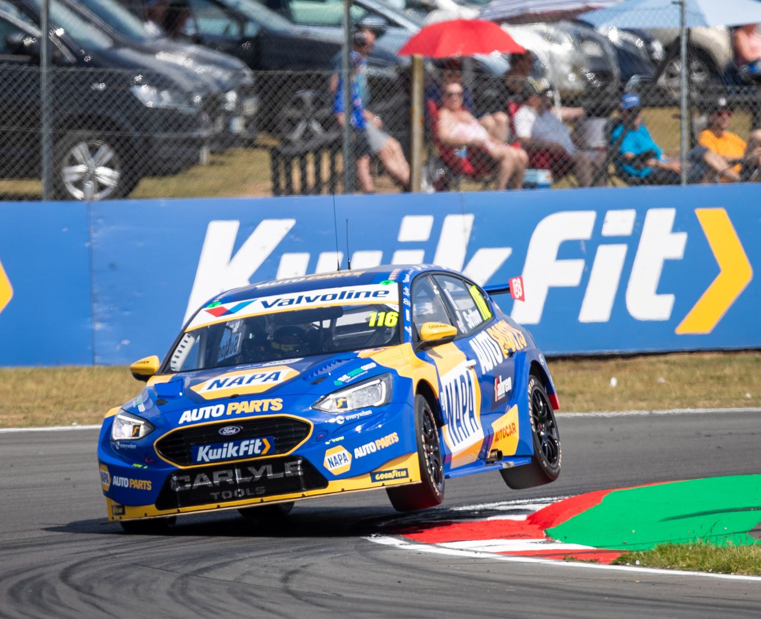 BTCC Napa racing on two wheels during the race at Snetterton circuit