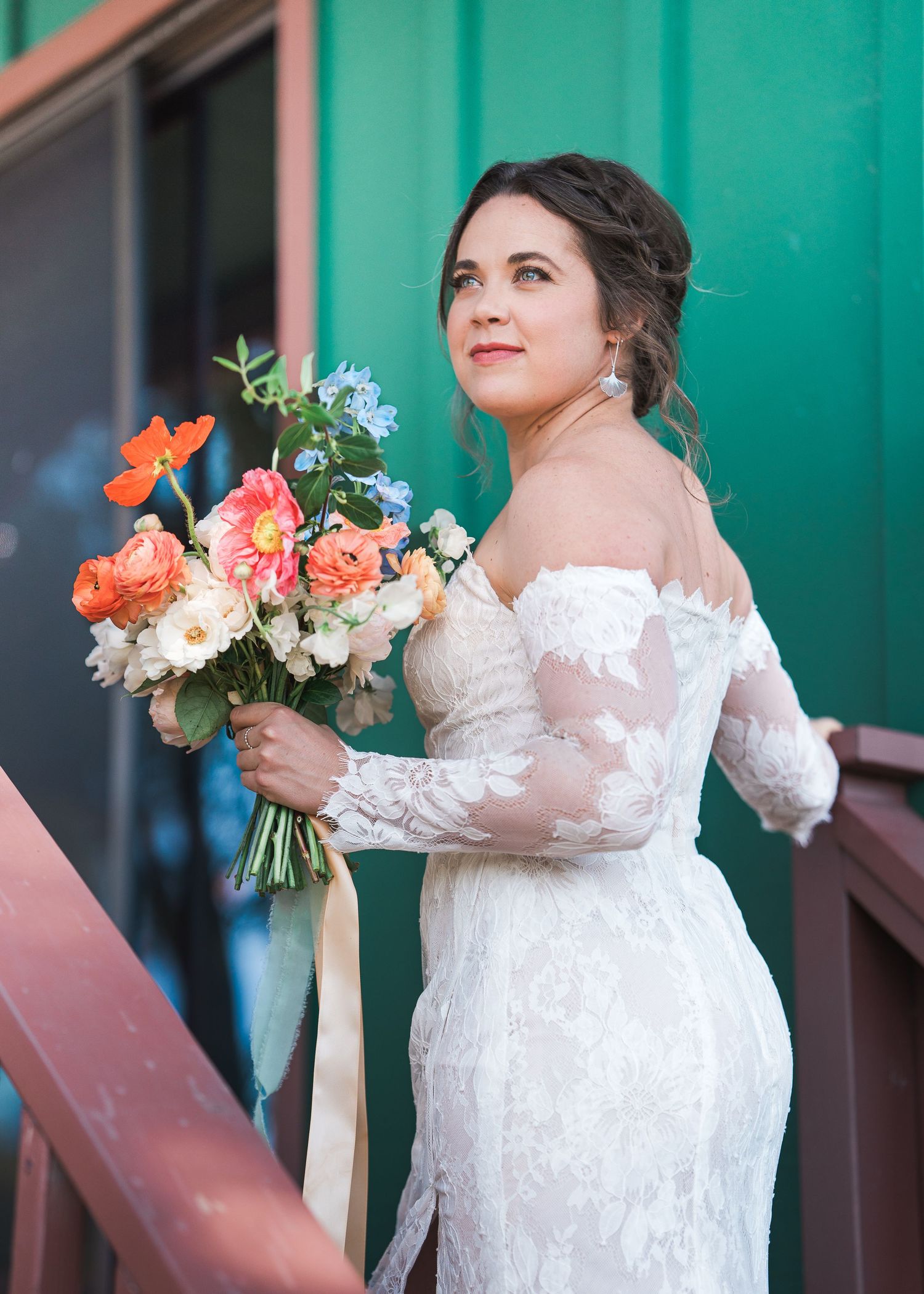 Wedding photos with white lace dress and coral bouquet against teal background.