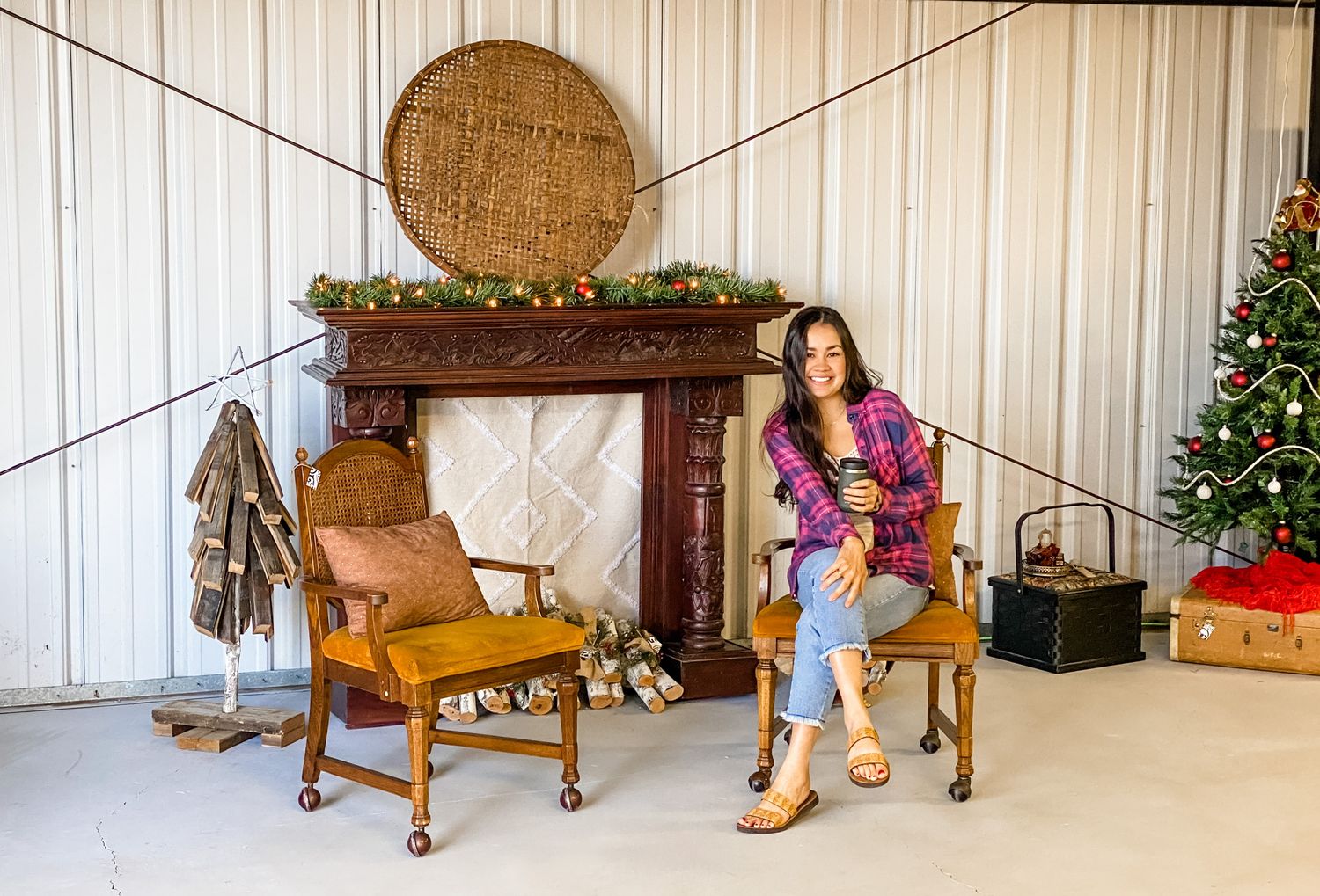 Cozy holiday scene with vintage furniture and Christmas decorations in a rustic indoor setting.