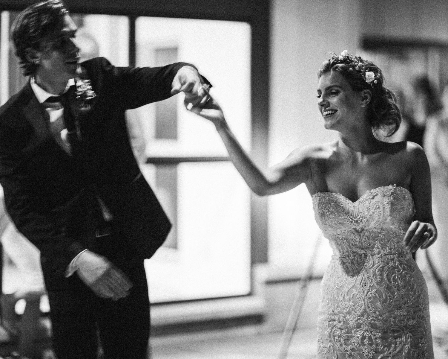Black and white sequence of candid moments from a wedding celebration.