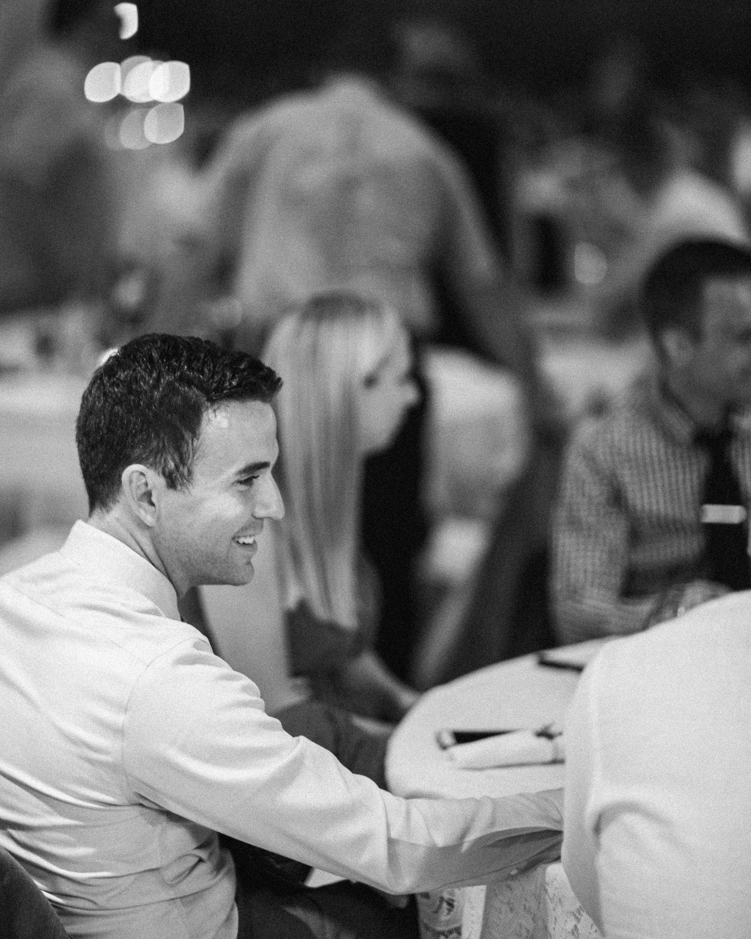 Black and white image showing a sequence of candid moments at what appears to be a formal event or celebration.