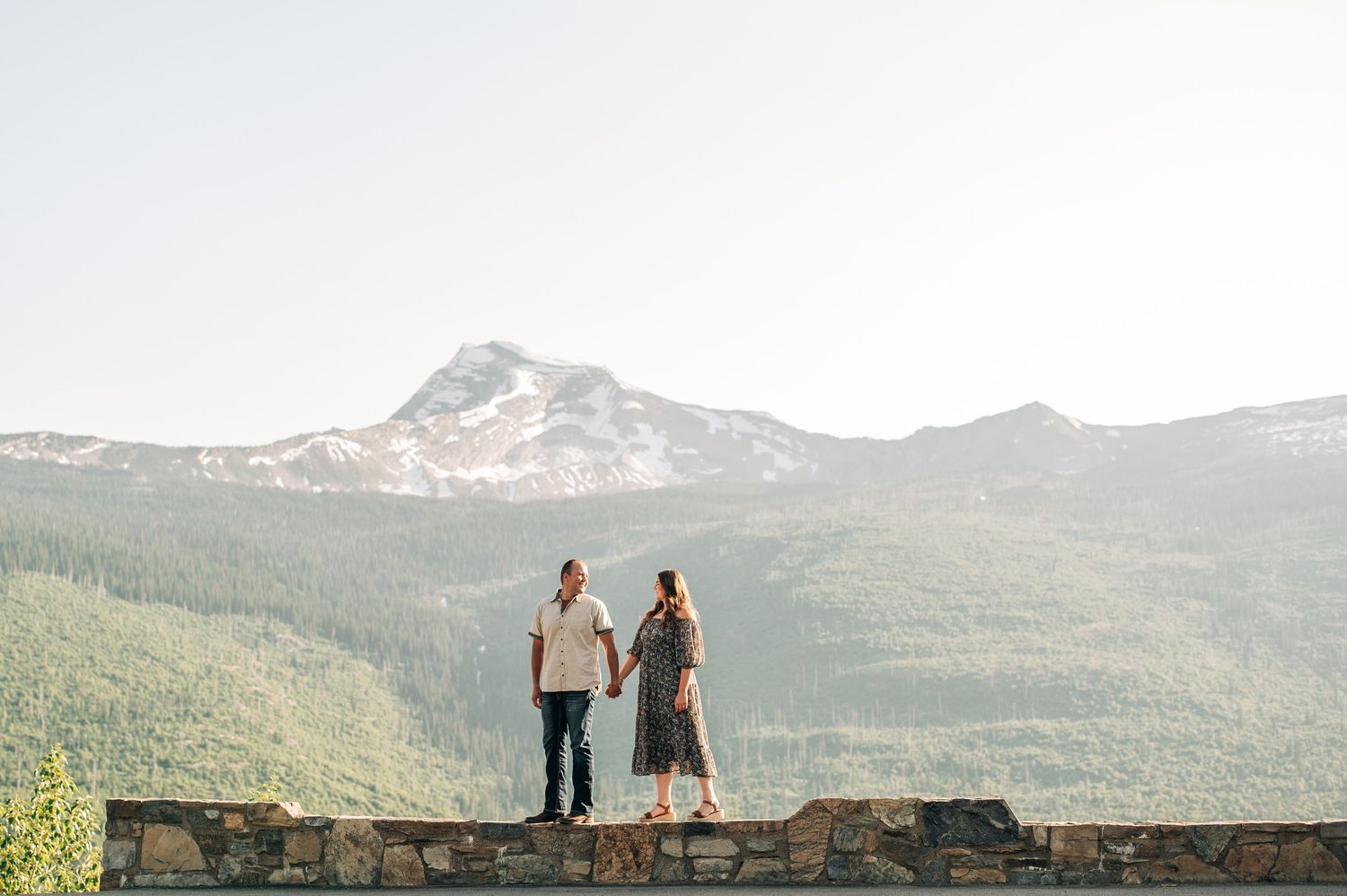 A group of four mountain photos show scenic views with couples enjoying nature and snow-capped peaks in the distance.
