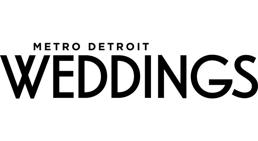 Black abstract geometric symbol on white background.